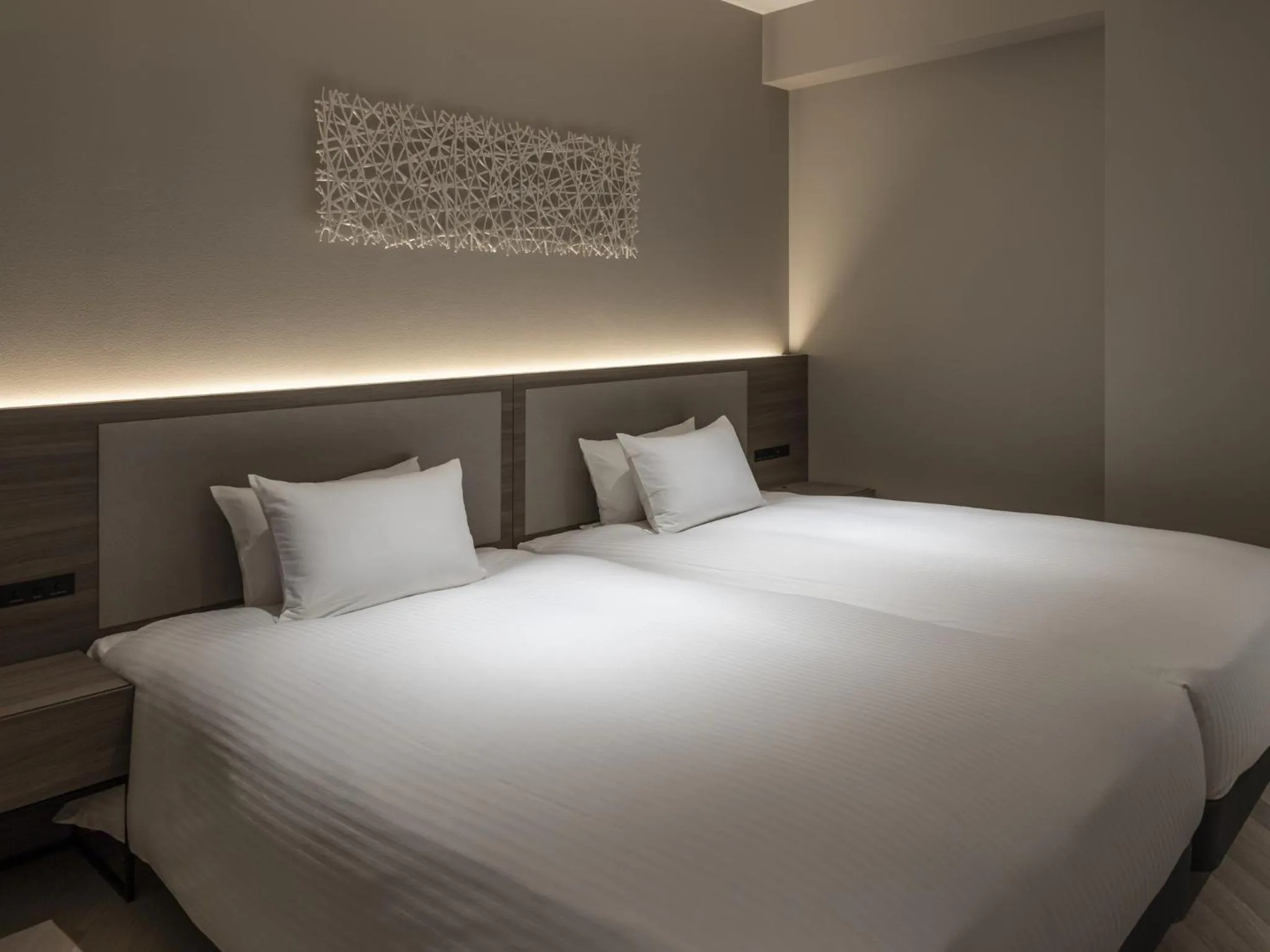 Bed in HOTEL FORZA SAPPORO STATION