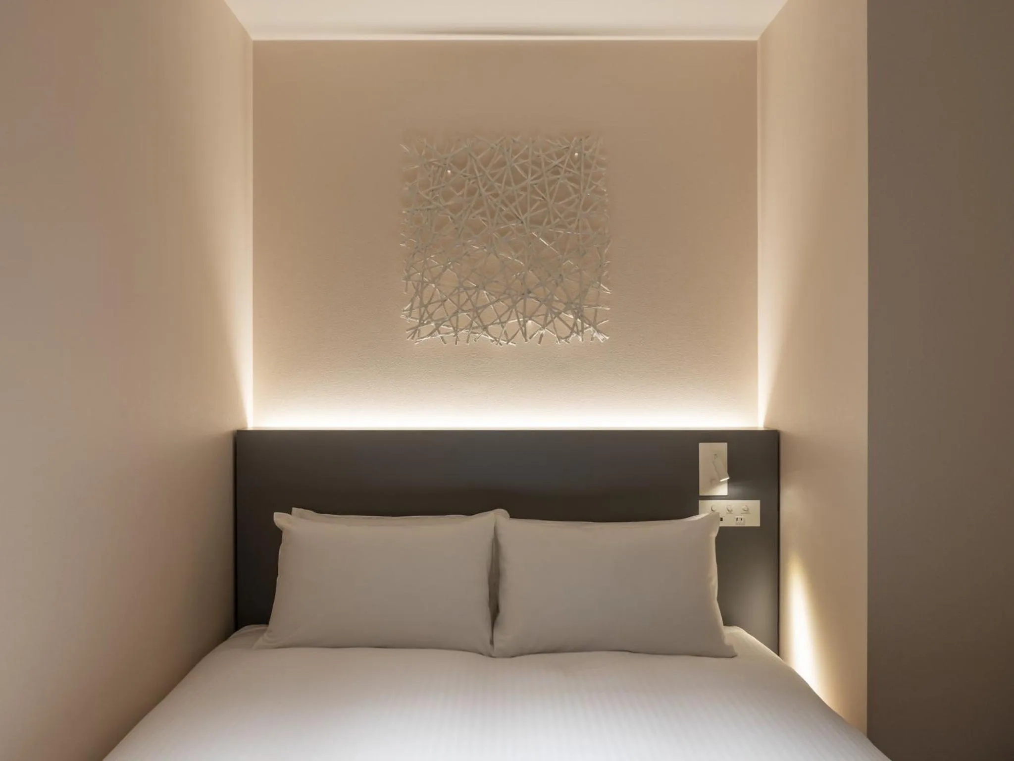 Bed in HOTEL FORZA SAPPORO STATION