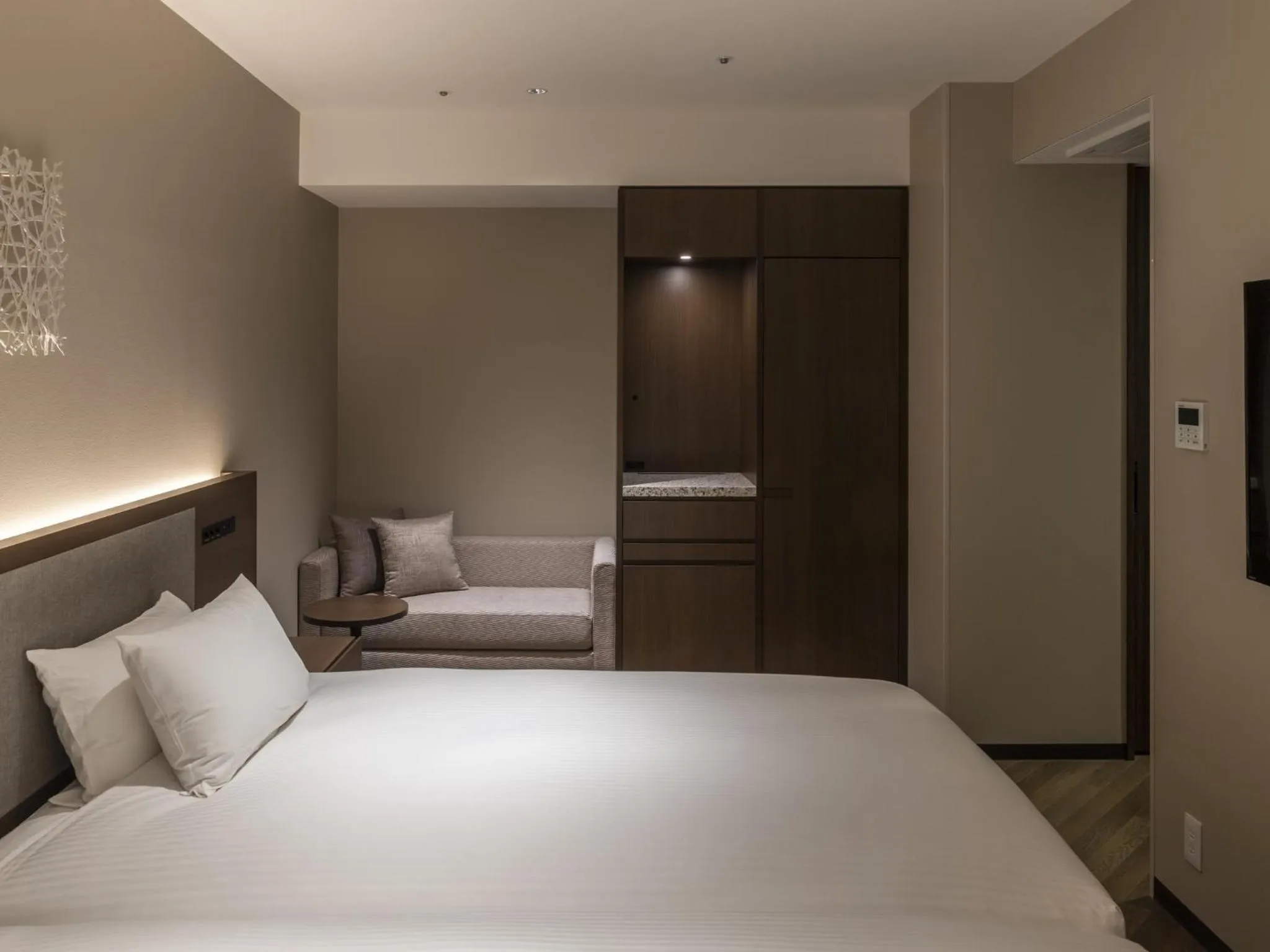 Bed in HOTEL FORZA SAPPORO STATION