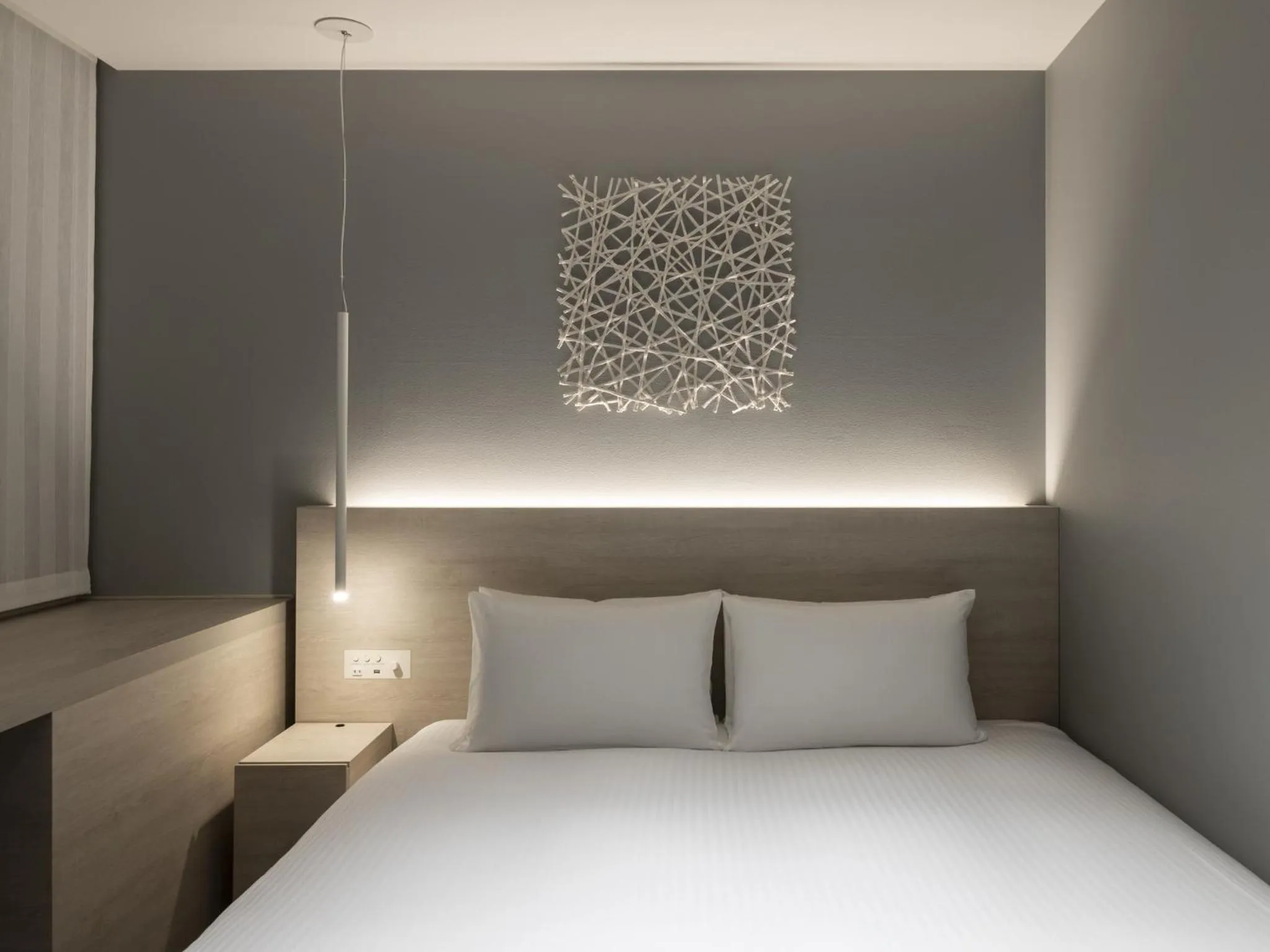 Bed in HOTEL FORZA SAPPORO STATION