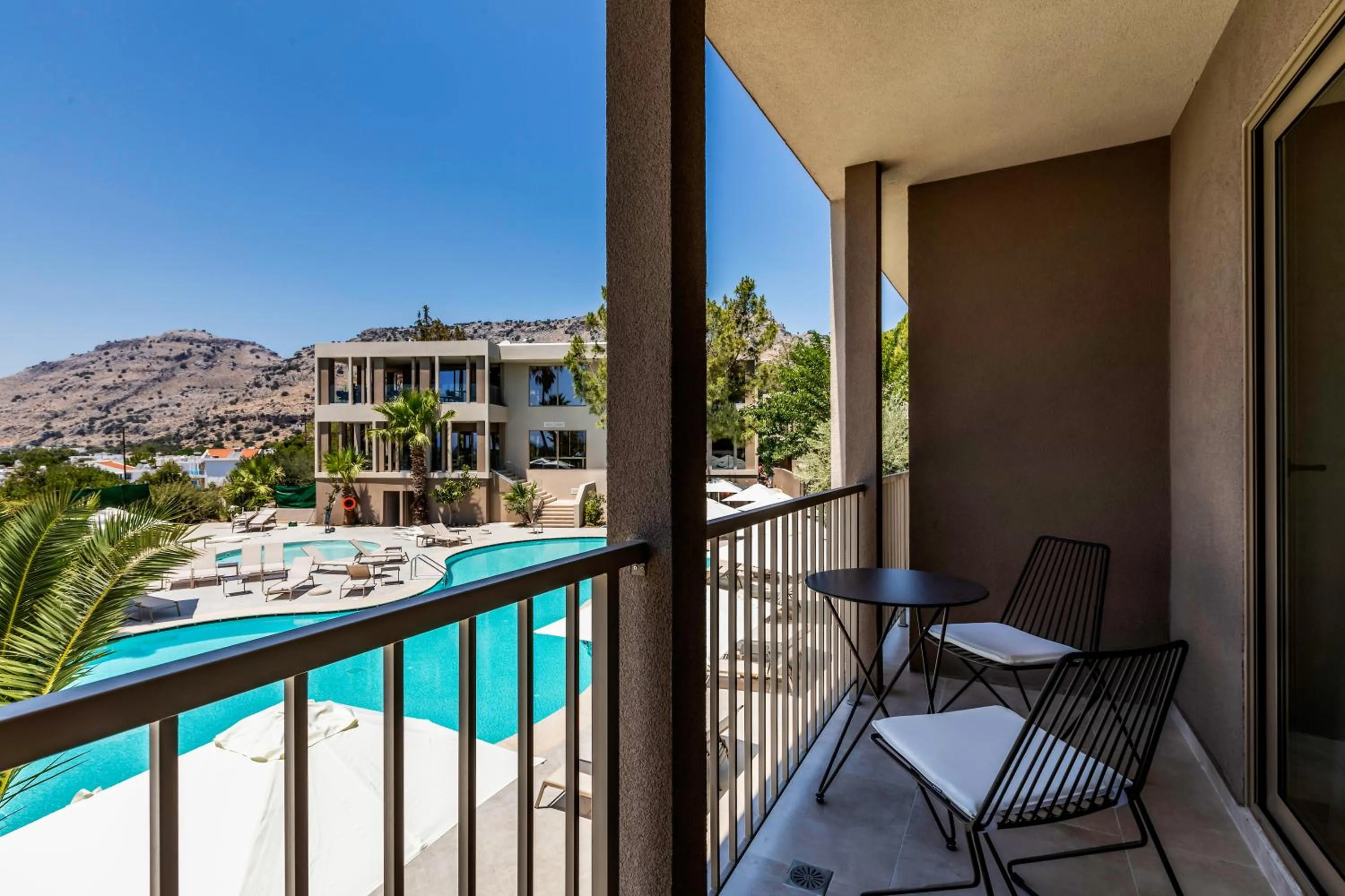 Pool view in White Olive Premium Lindos