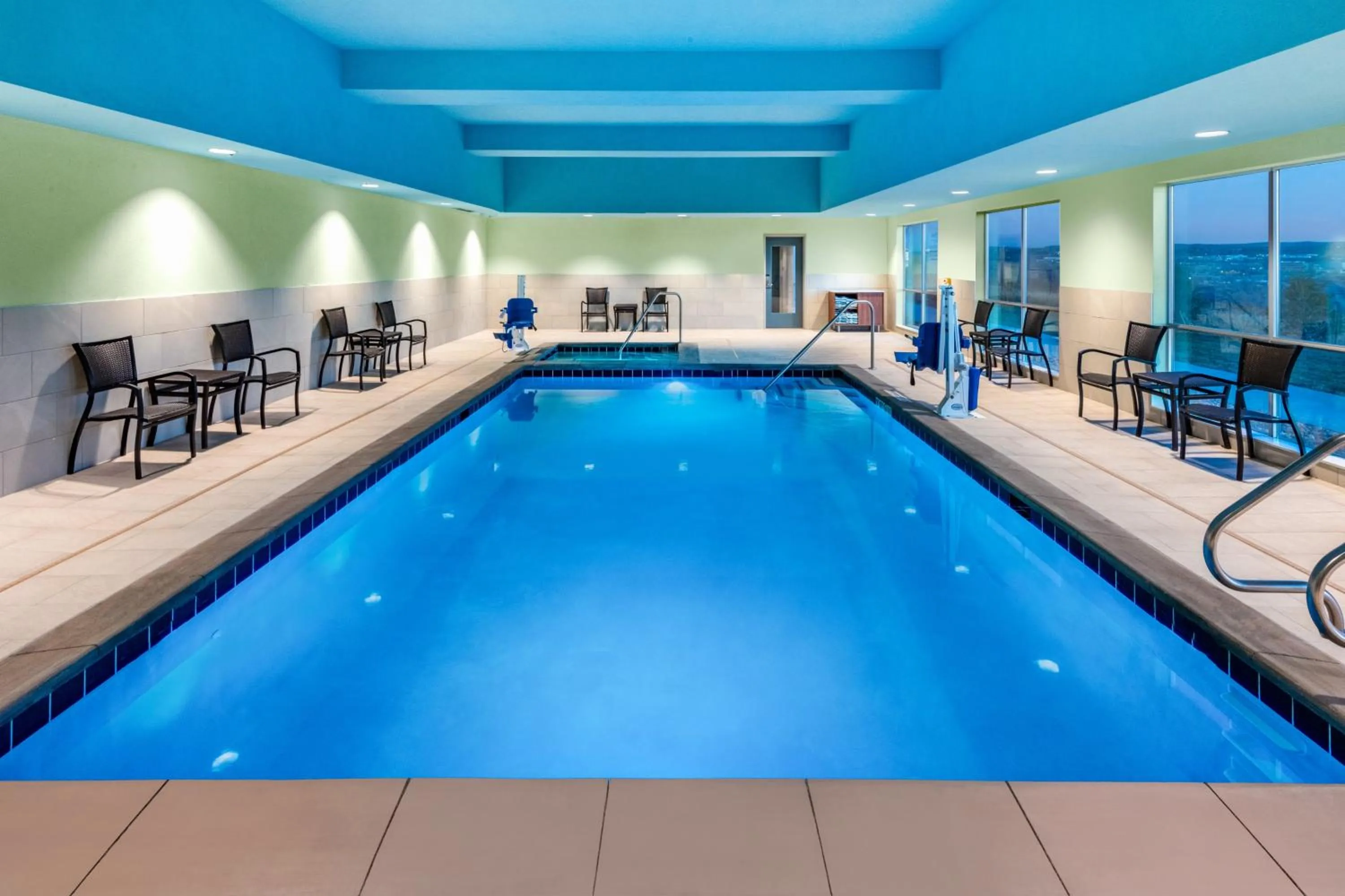 Swimming pool in Holiday Inn Express & Suites - Colorado Springs South I-25 by IHG