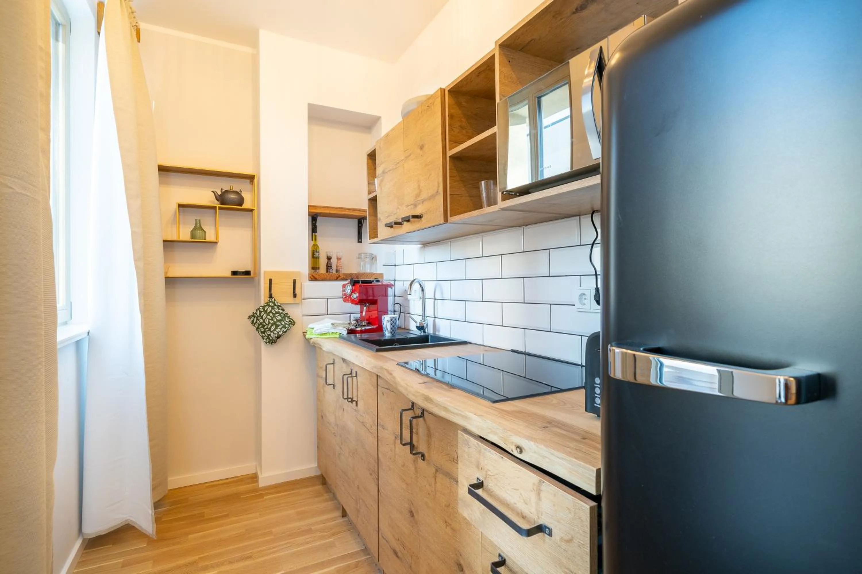 Kitchen or kitchenette in Design Apartments - "Am Weinberg"