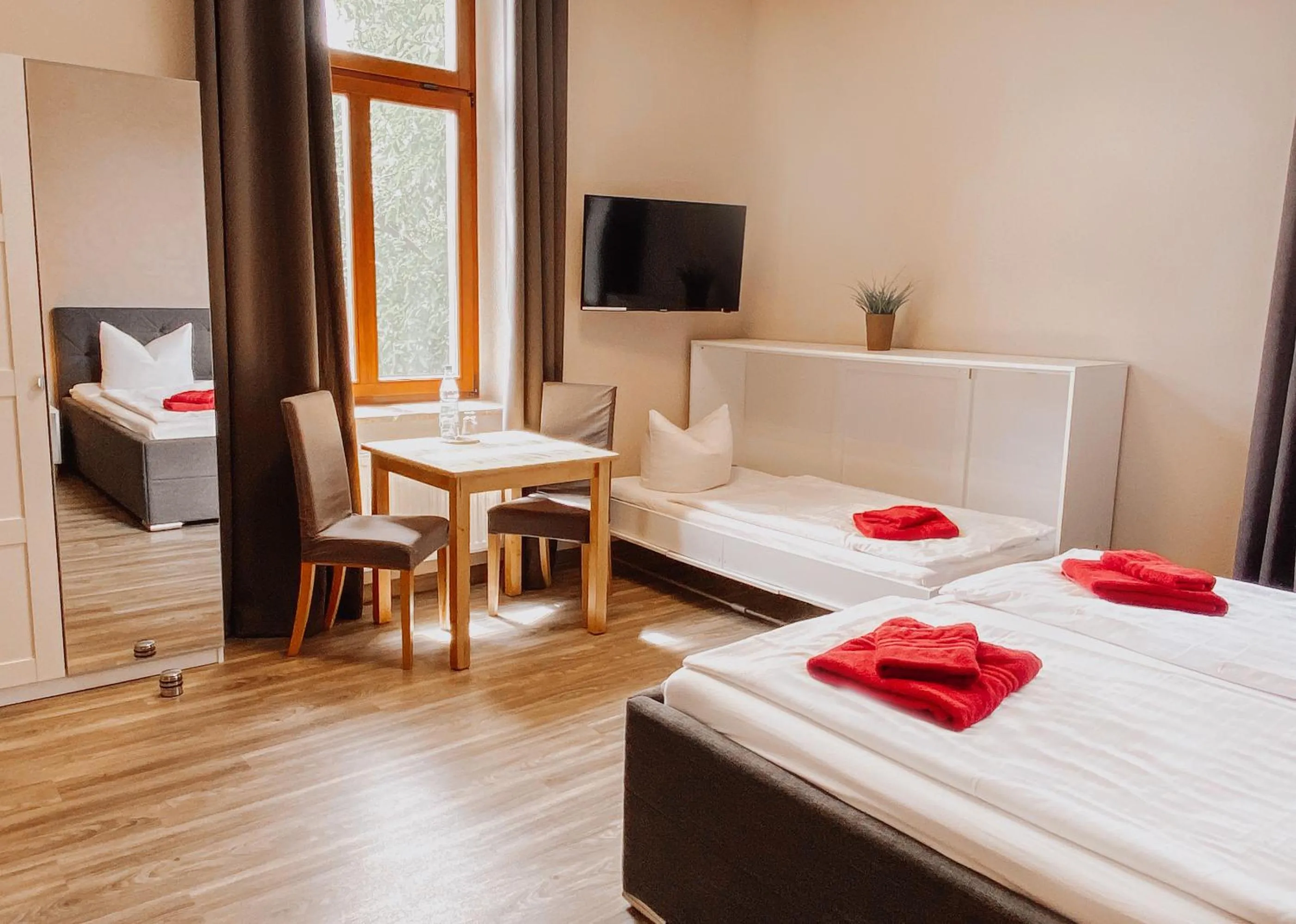 Seating area, Bed in Hotel Am Rittergut