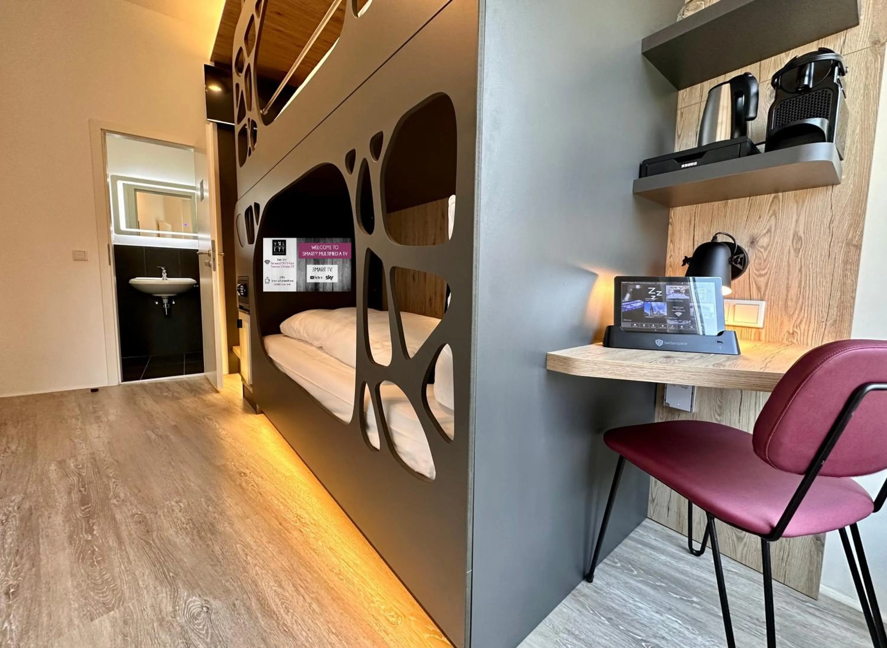 Photo of the whole room, Bed in SMARTY Cologne Dom Hotel - Boardinghouse - KONTAKTLOSER SELF CHECK-IN