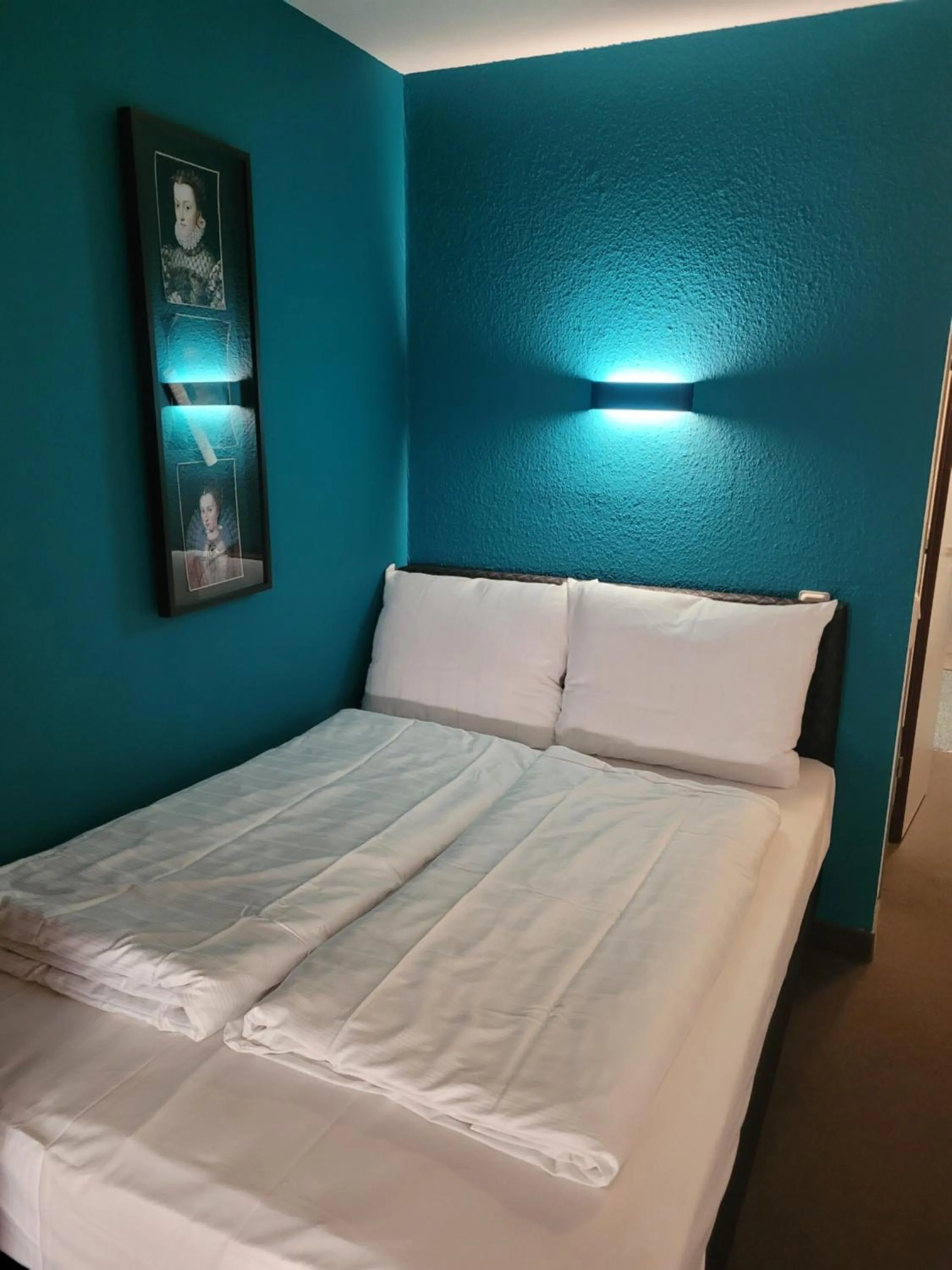 Bed in Hotel Christina