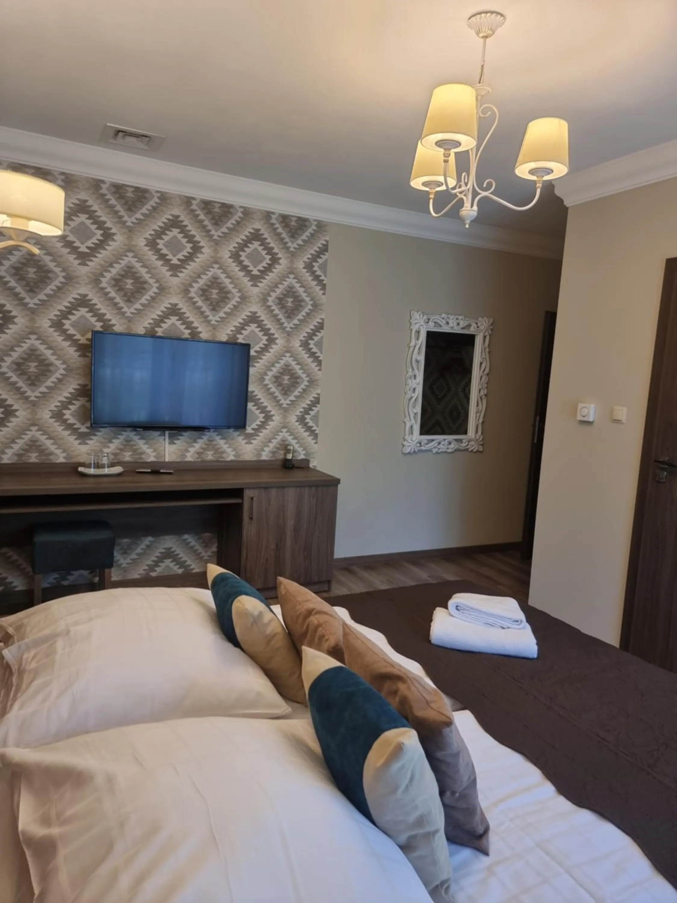 Communal lounge/ TV room, Bed in Dworek za Lasem