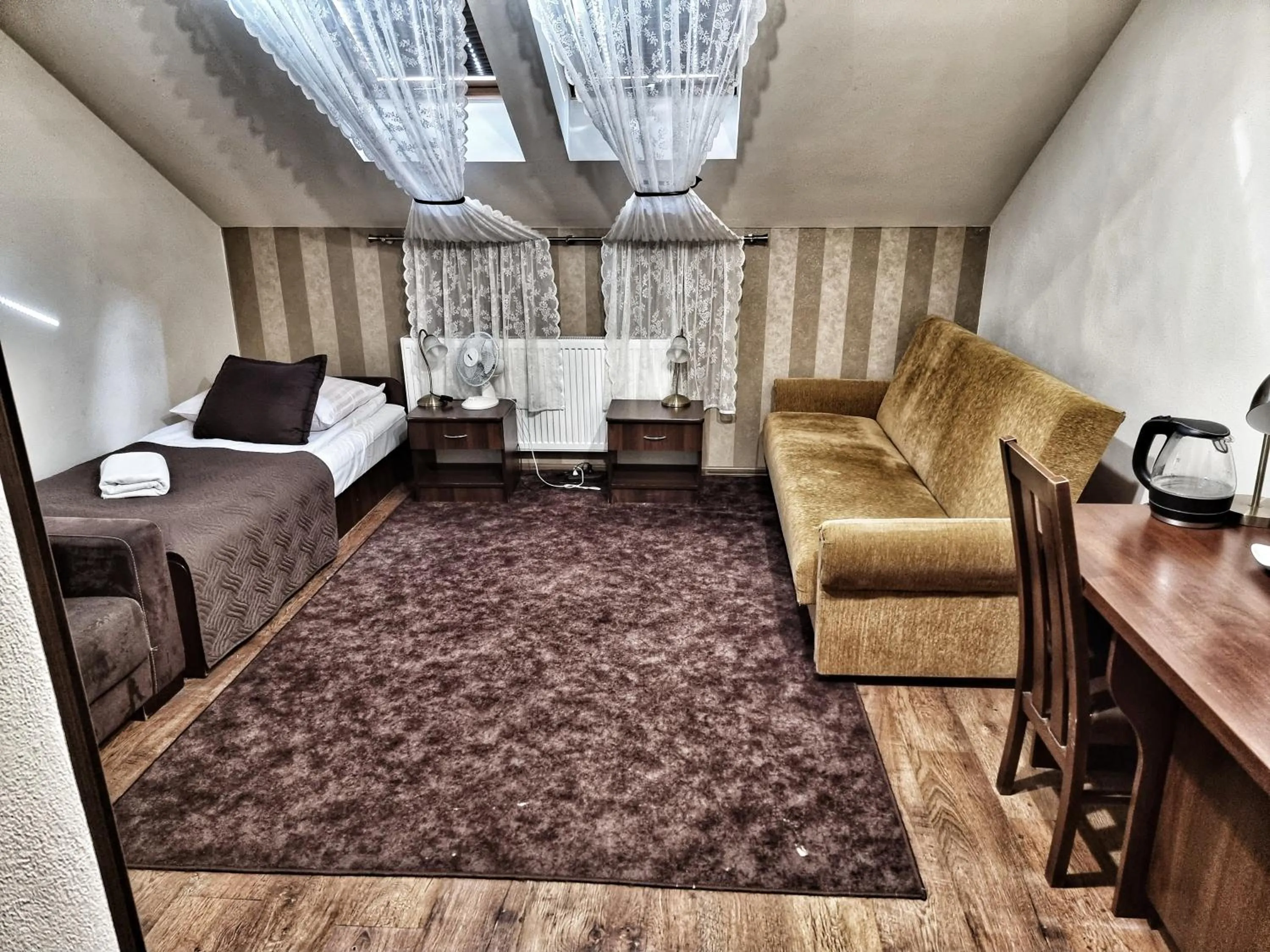 Seating area in Dworek za Lasem