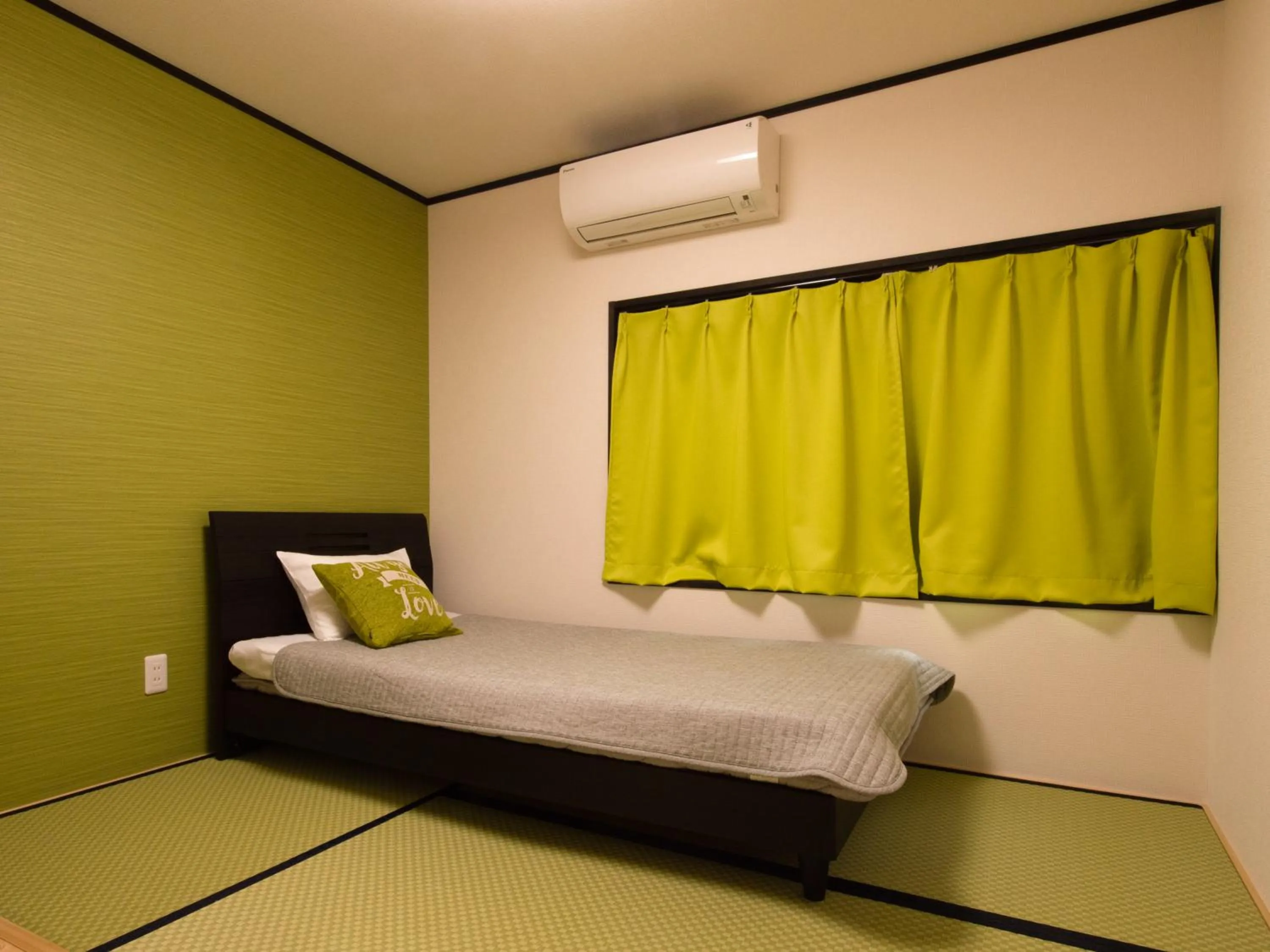 Bed in Guest House Suzumeno Kakurembo