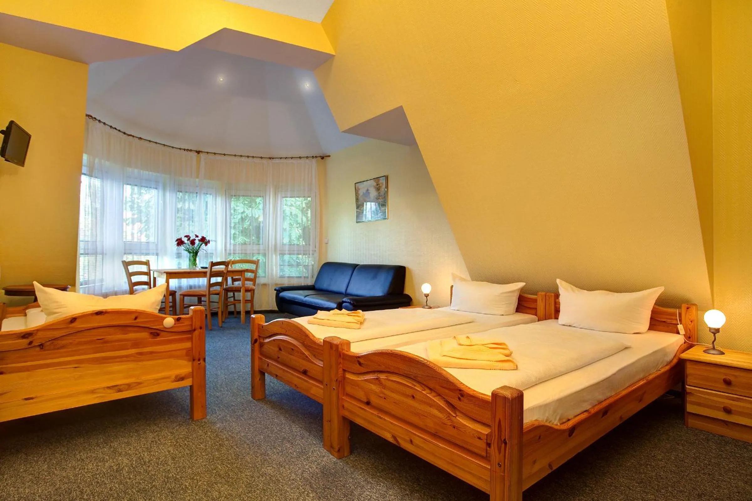 Seating area, Bed in Hotel Atlantic