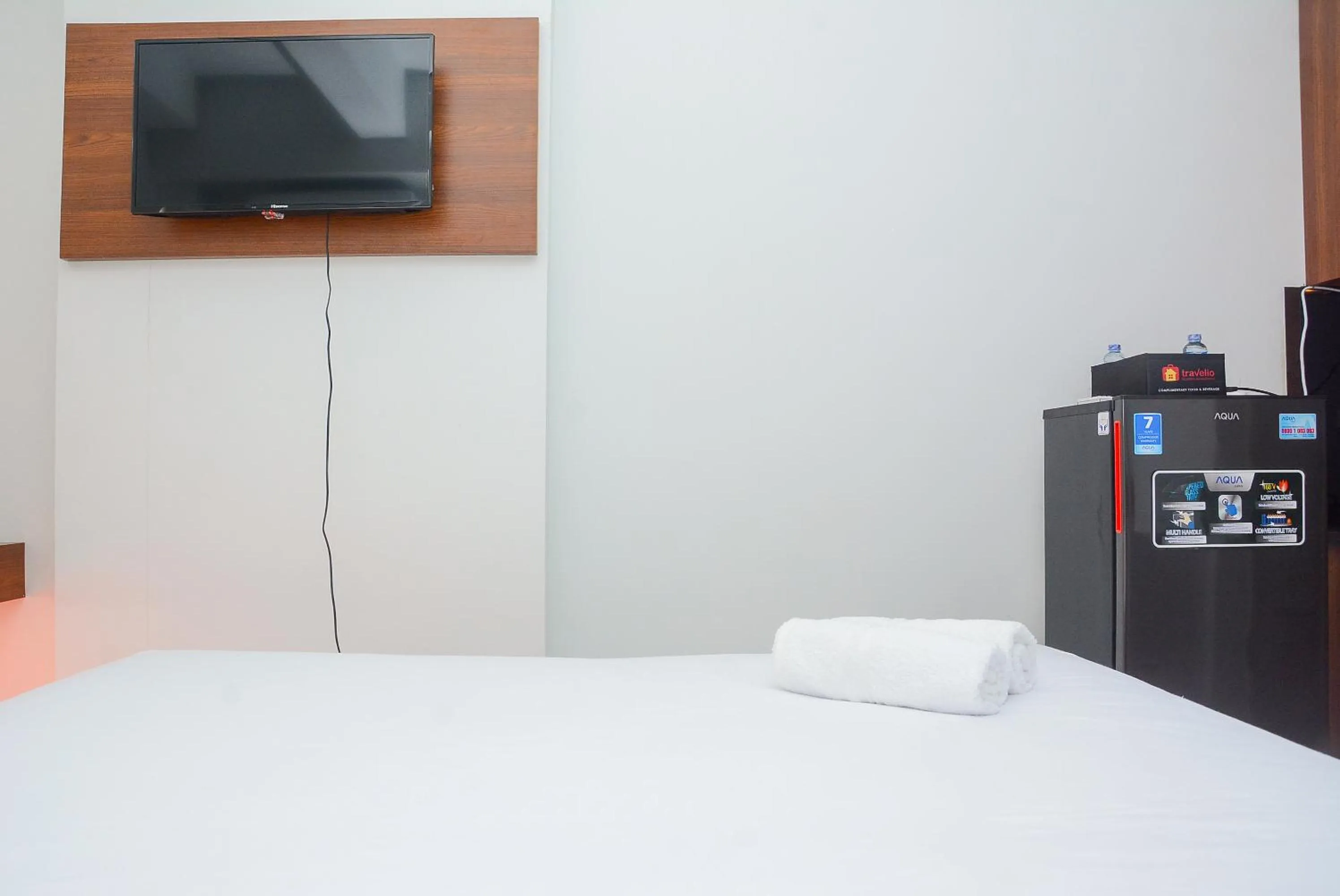 Bedroom, Bed in Comfy Studio Room at Patraland Urbano Apartment By Travelio