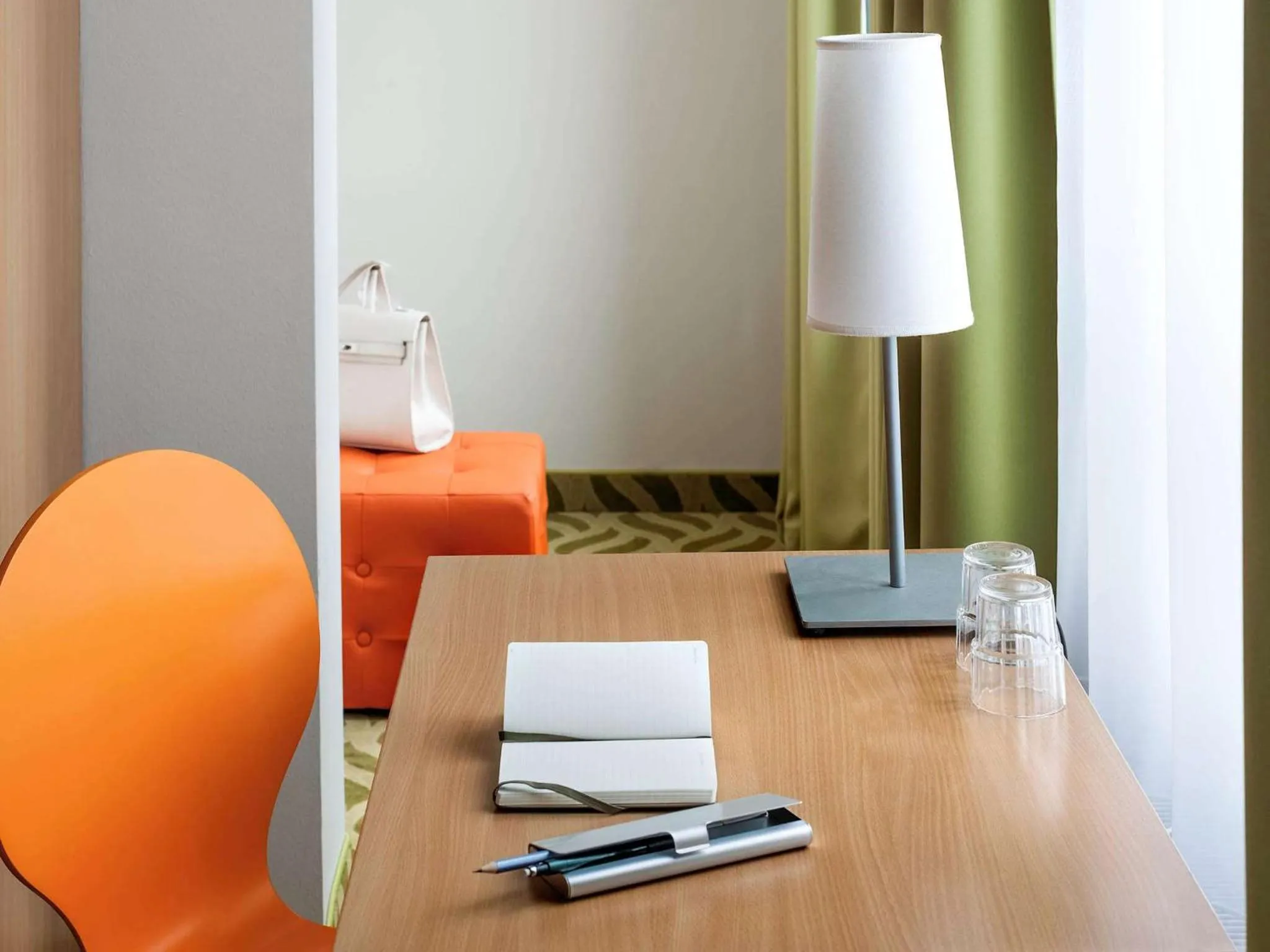 Photo of the whole room, TV/Entertainment Center in ibis Styles Berlin City Ost