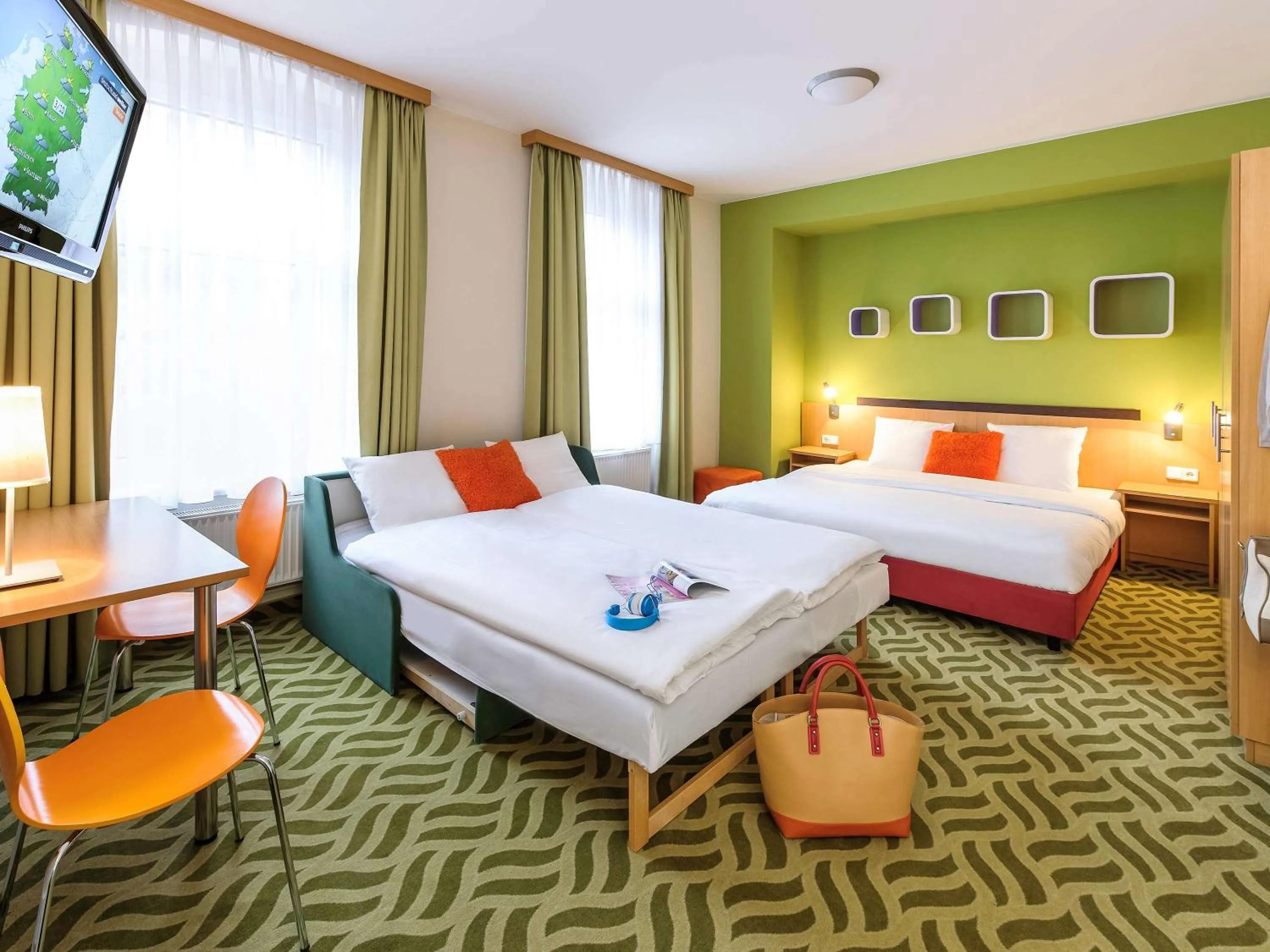 Photo of the whole room in ibis Styles Berlin City Ost