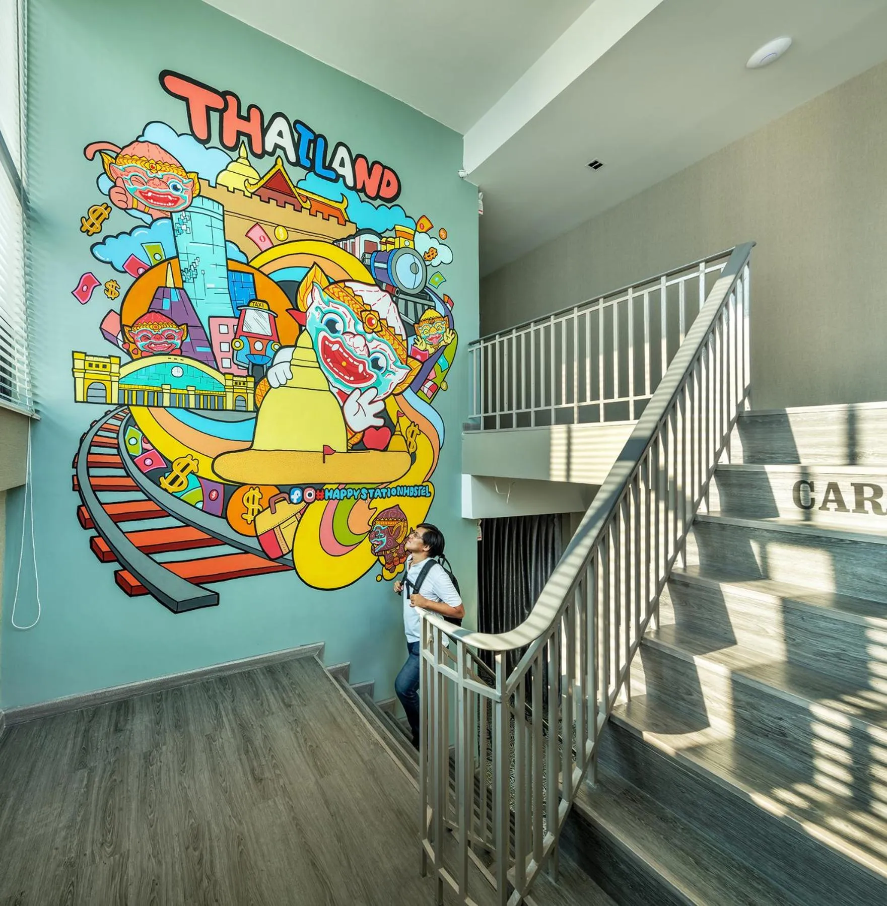 Property logo or sign in Happy Station Bangkok