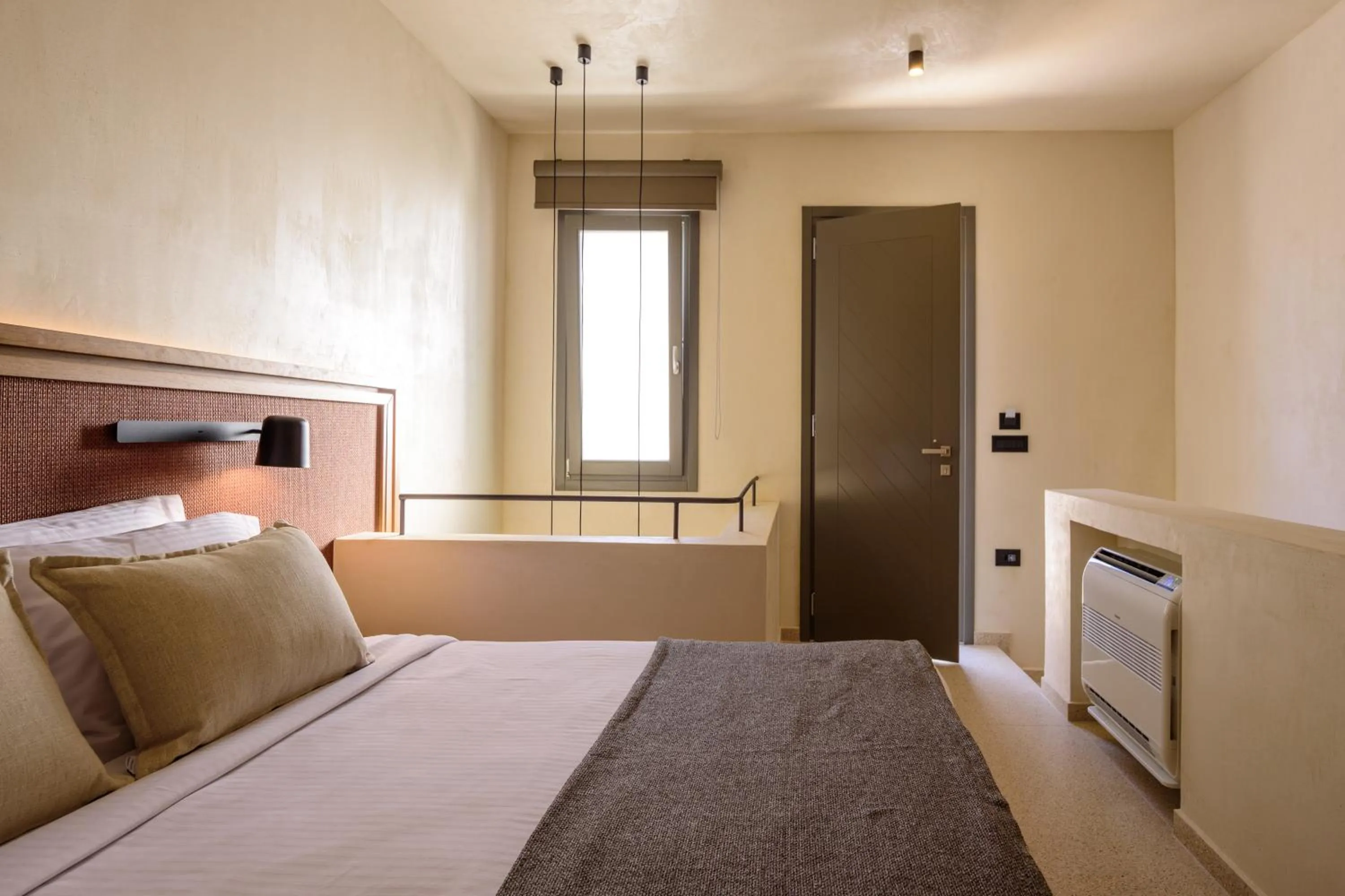 Bed in Alleys All-Suite Hotel & Spa