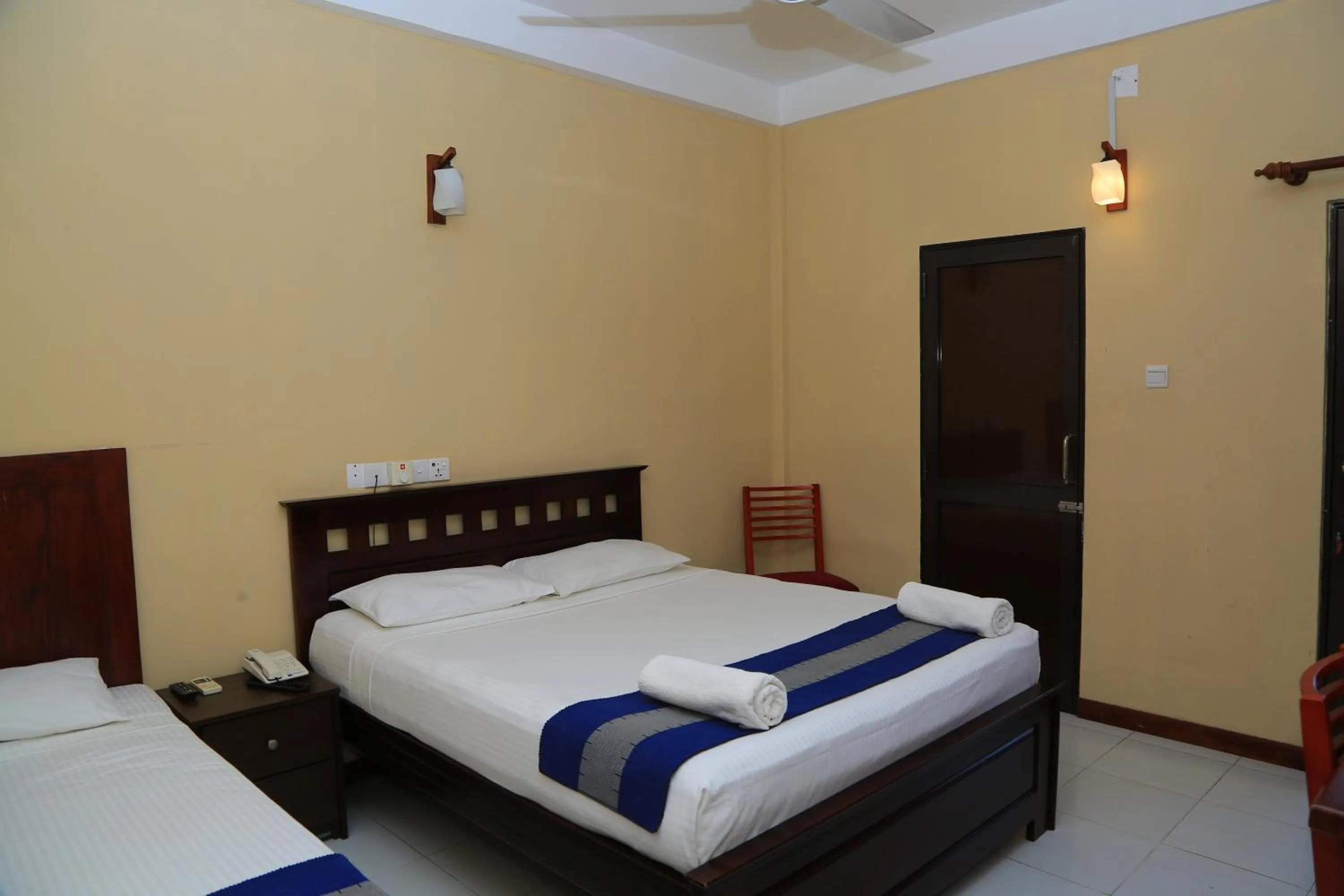 Bed in PJ Hotels Jaffna