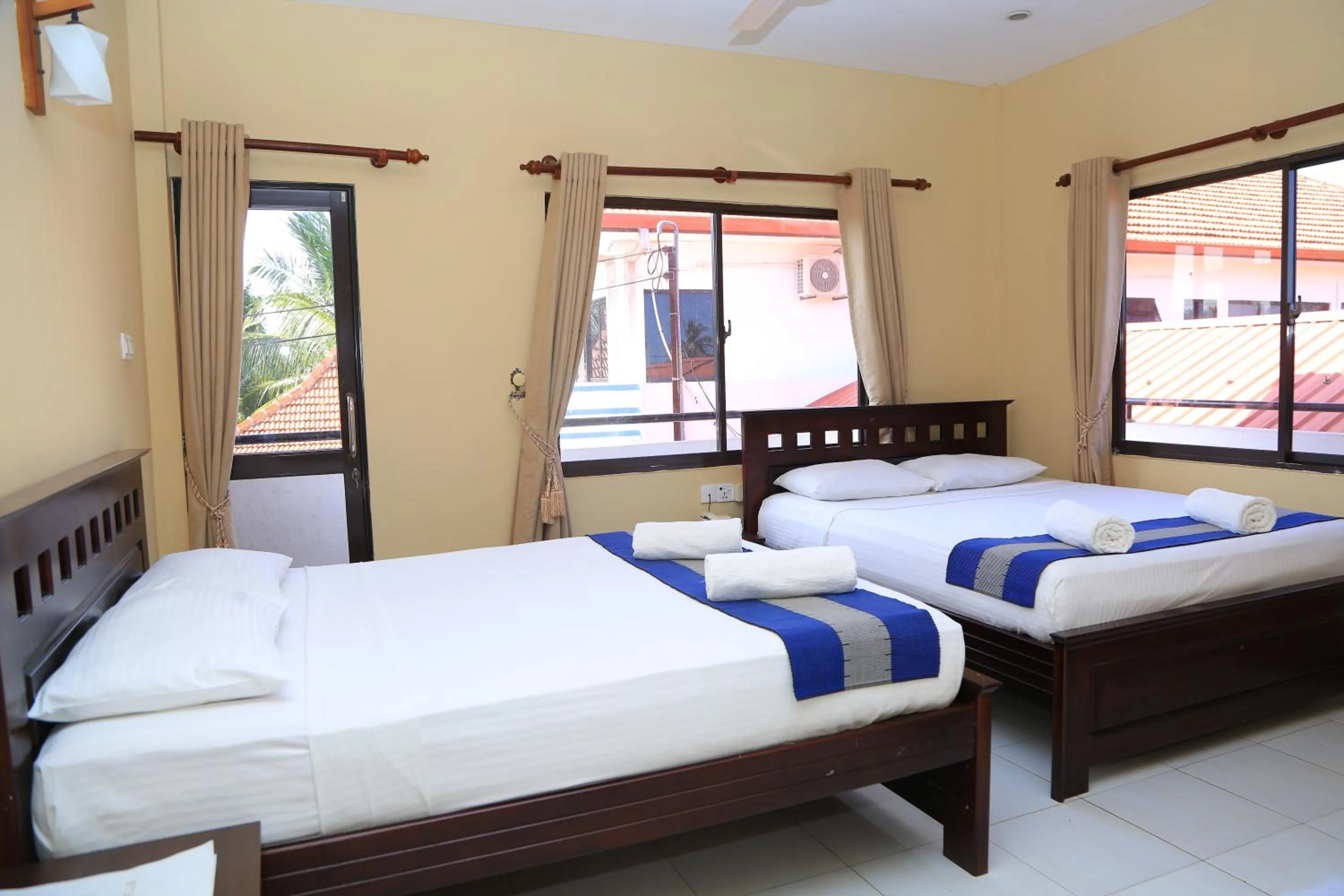 Bed in PJ Hotels Jaffna