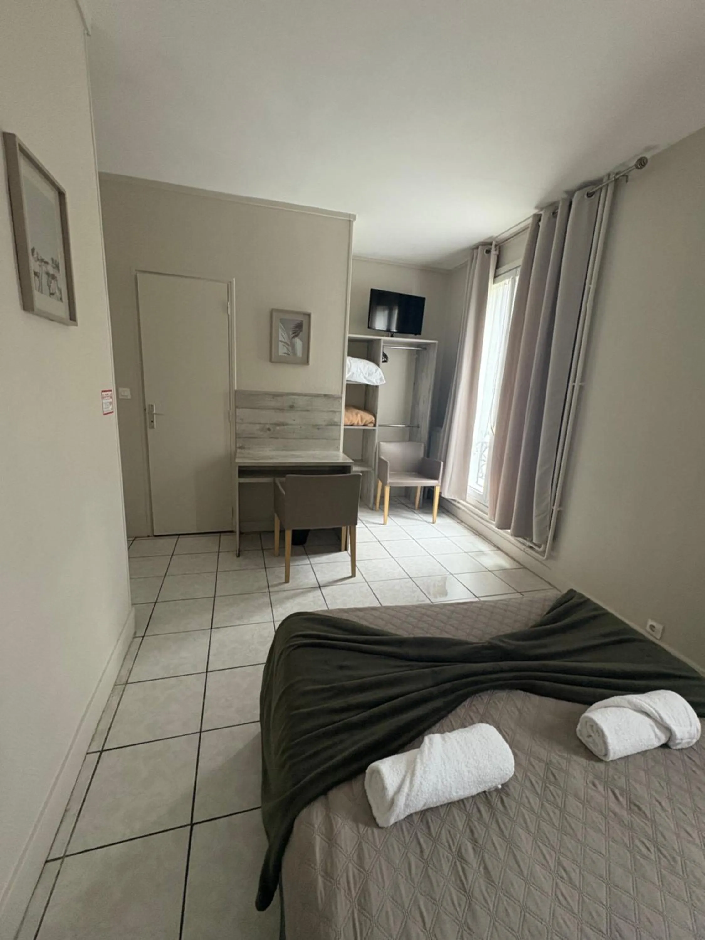 Bed in HOTEL DU MONT LOUIS