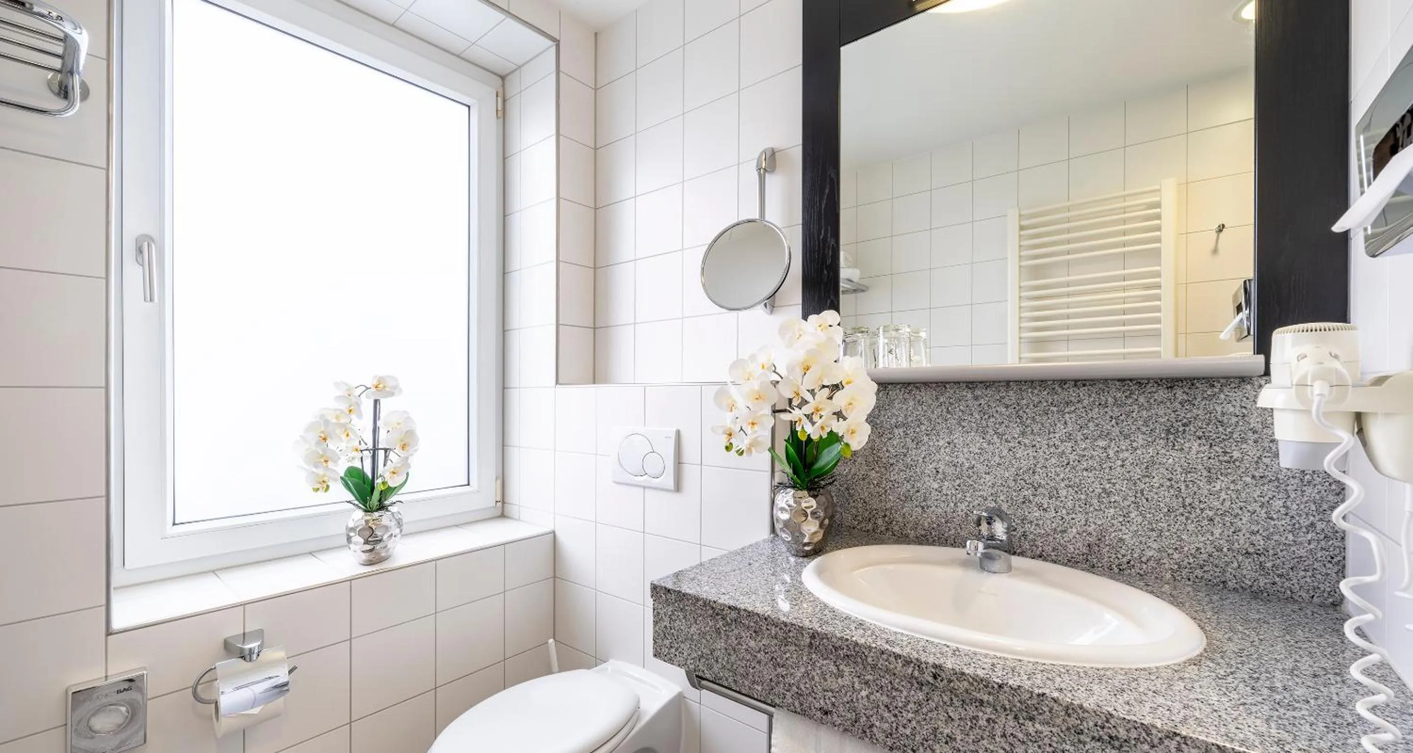 Bathroom in PLAZA INN Heidehof