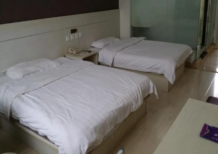 Bed in Thank Inn Chain Hotel Shandong Qingdao huangdao chongming island road