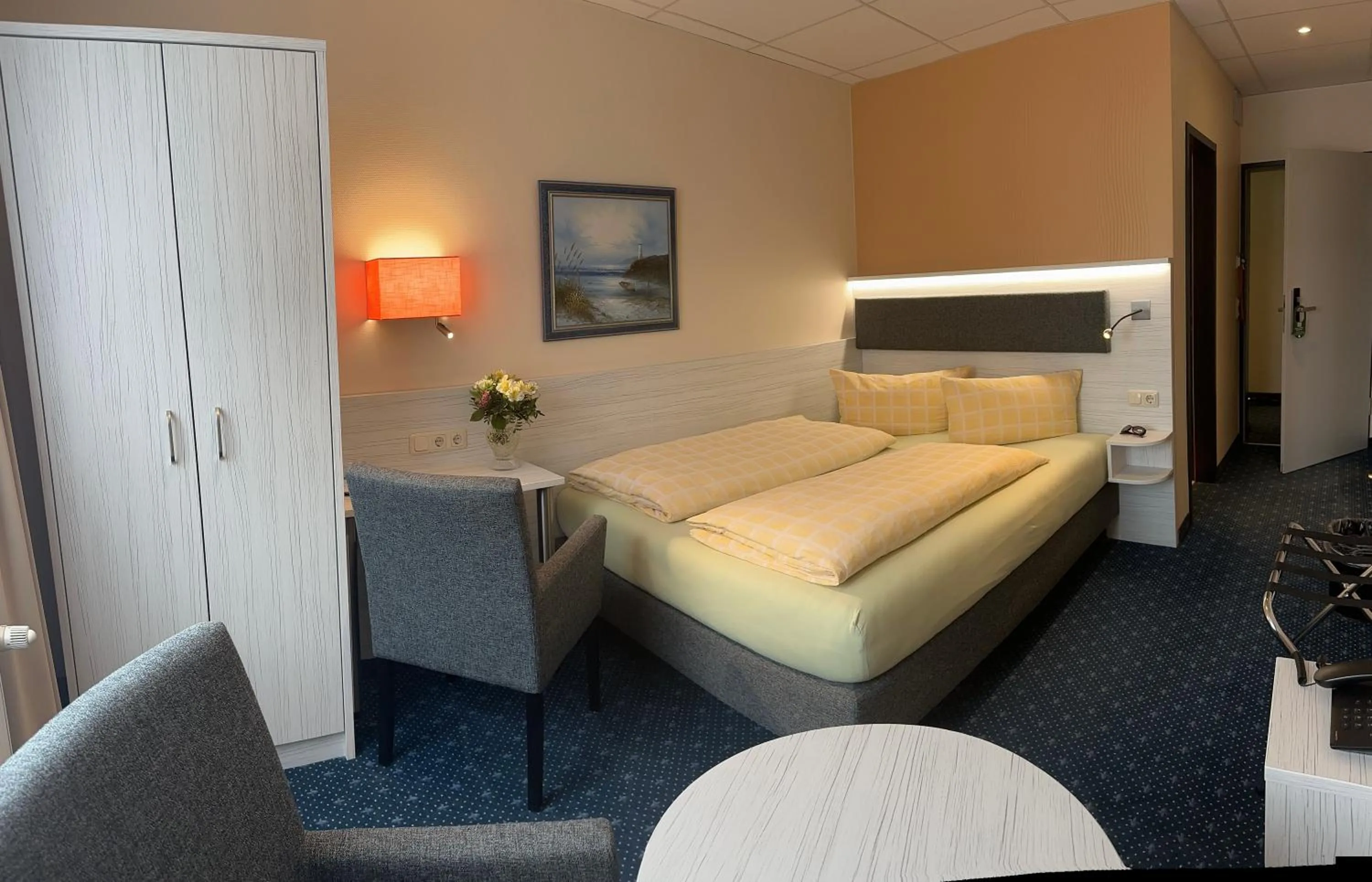 Bed in Dünenhotel am Meer