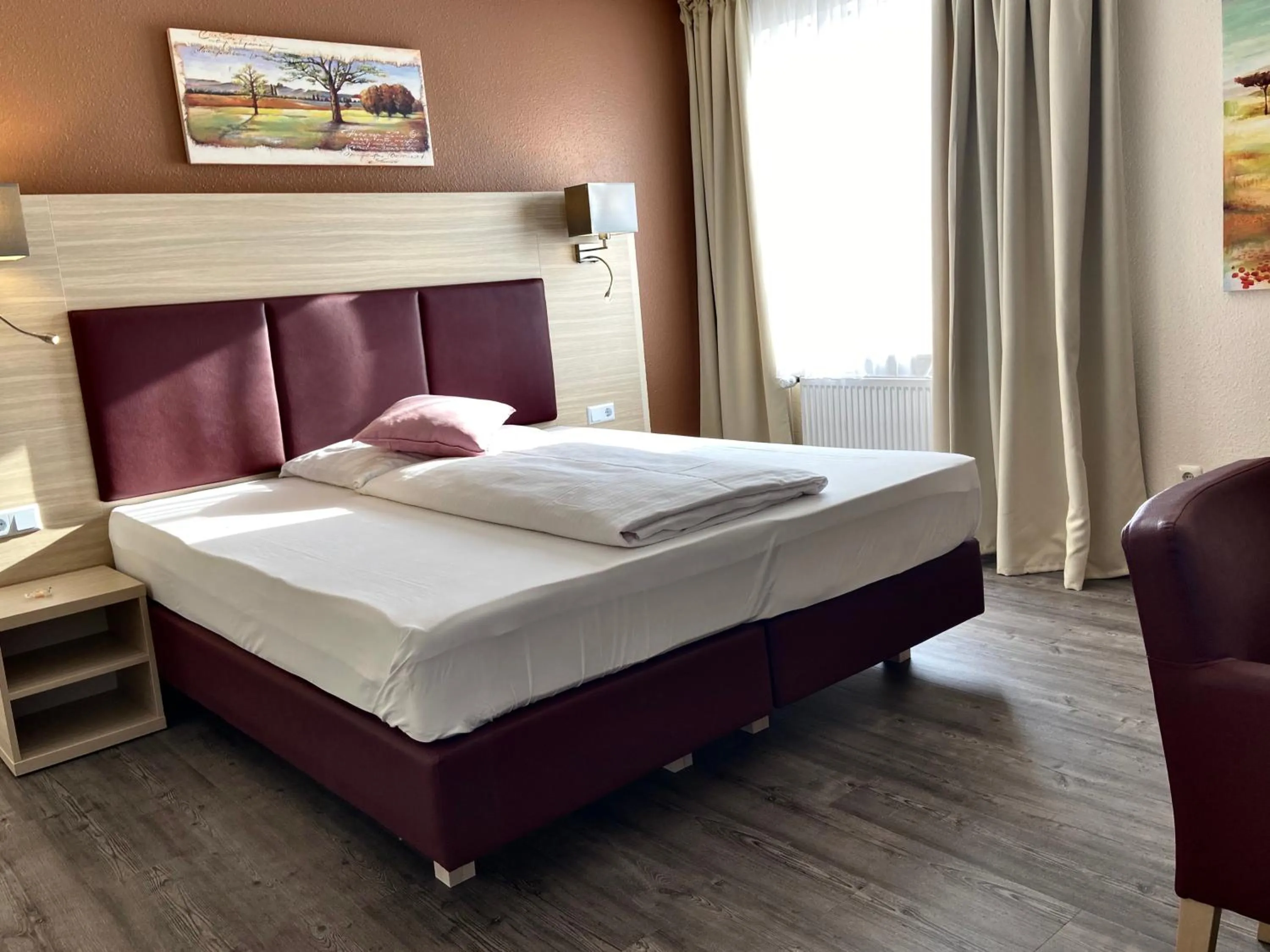 Photo of the whole room, Bed in Residenz Hotel Neu Wulmstorf