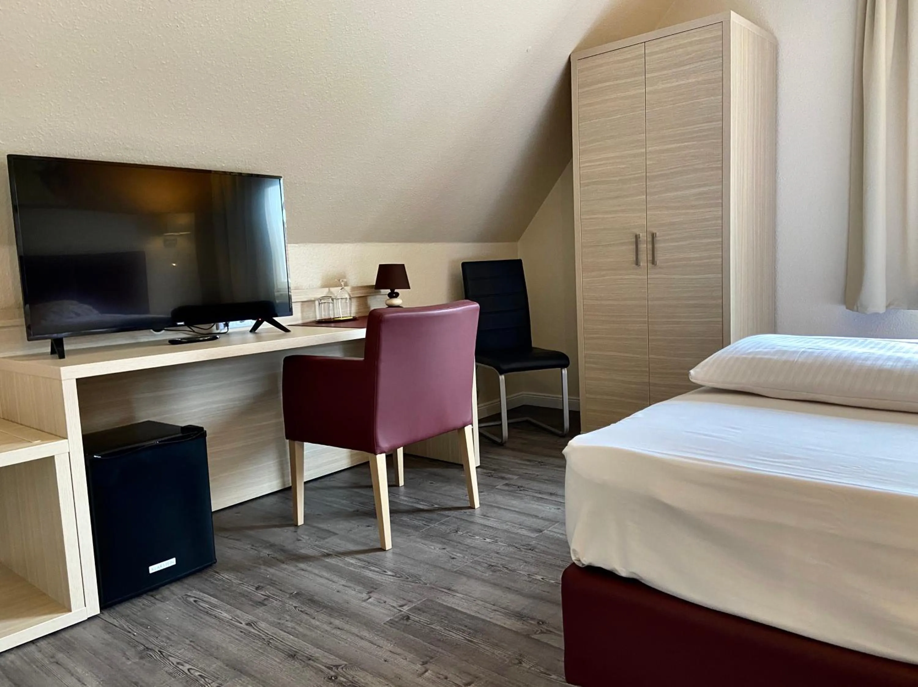 Photo of the whole room, Bed in Residenz Hotel Neu Wulmstorf