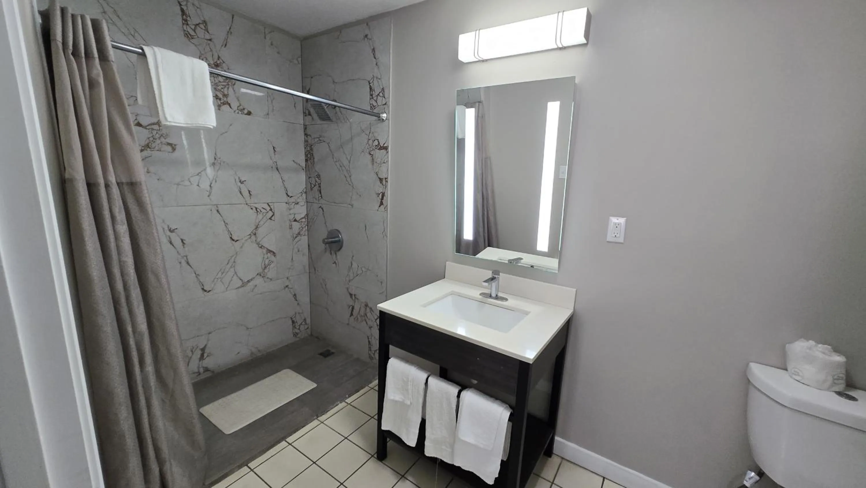 Bathroom in Deerfield Inn by OYO McComb I-55