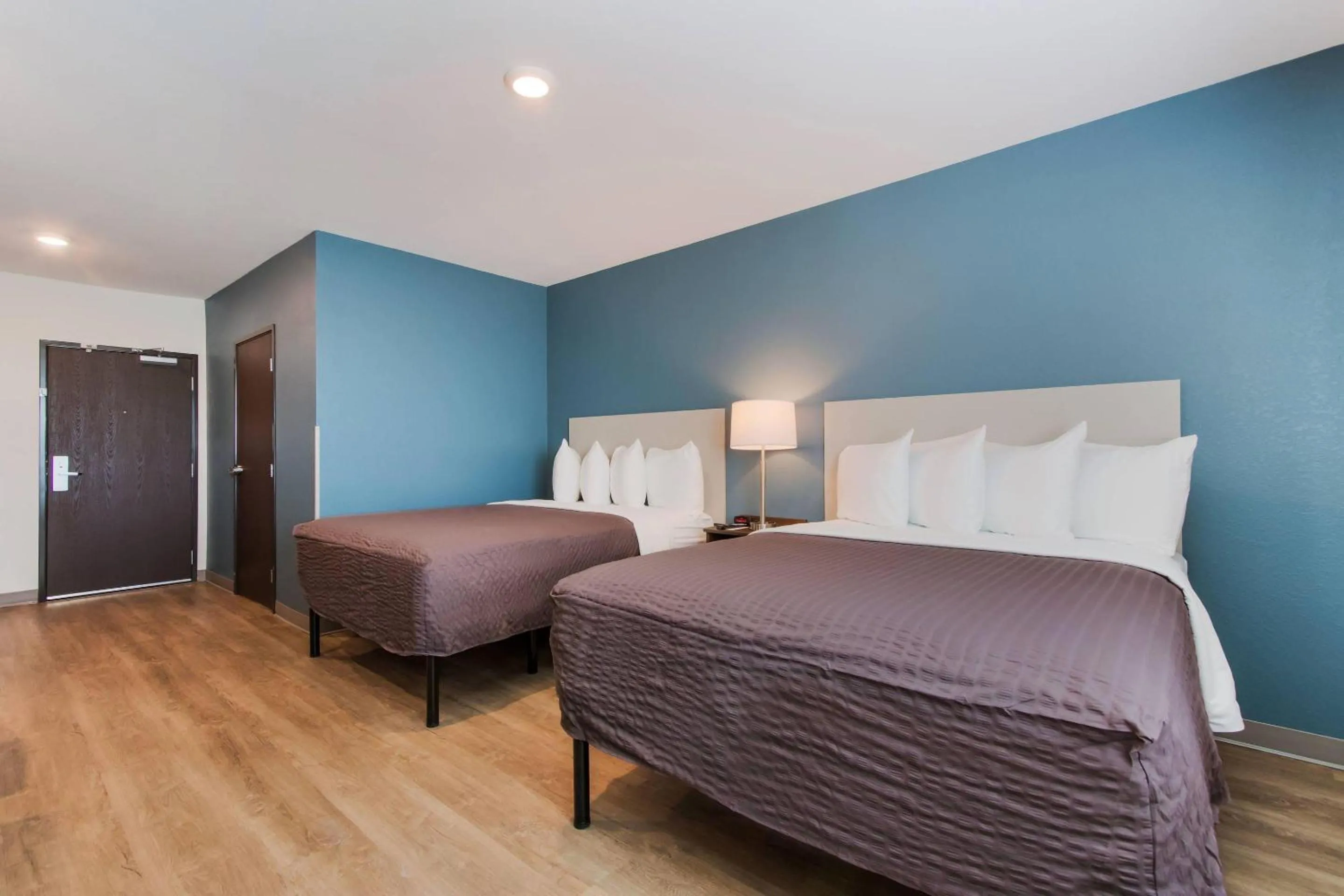 Bedroom, Bed in WoodSpring Suites Tamarac