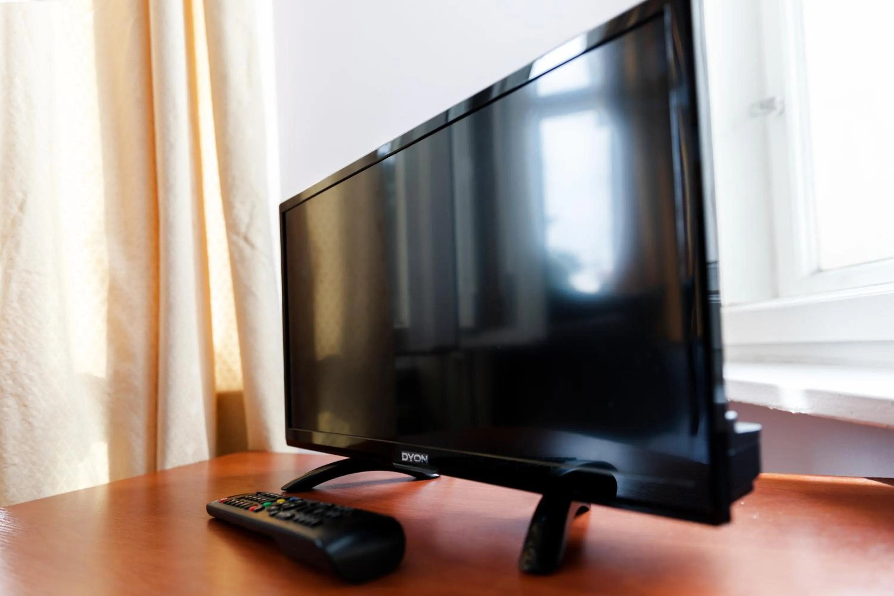 TV and multimedia, TV/Entertainment Center in Hotel Eden am Zoo