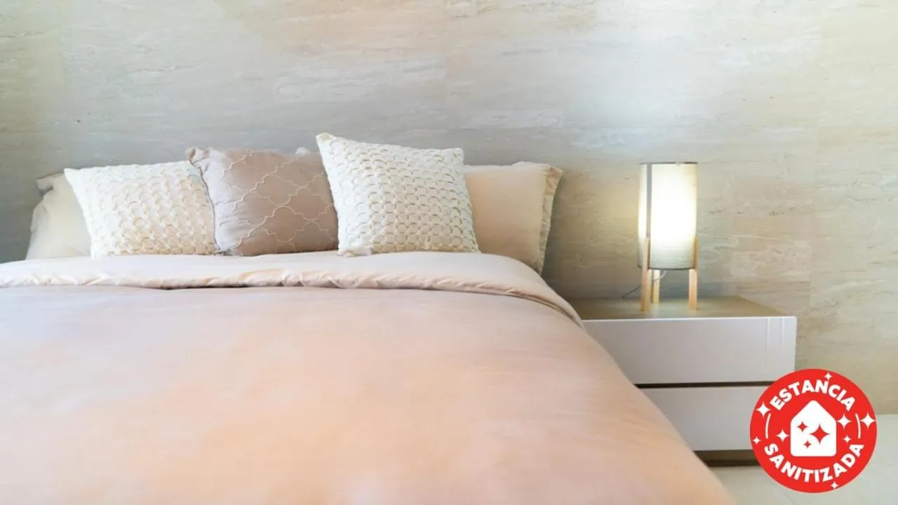 Bed in ECONOSUITES FUNDIDORA