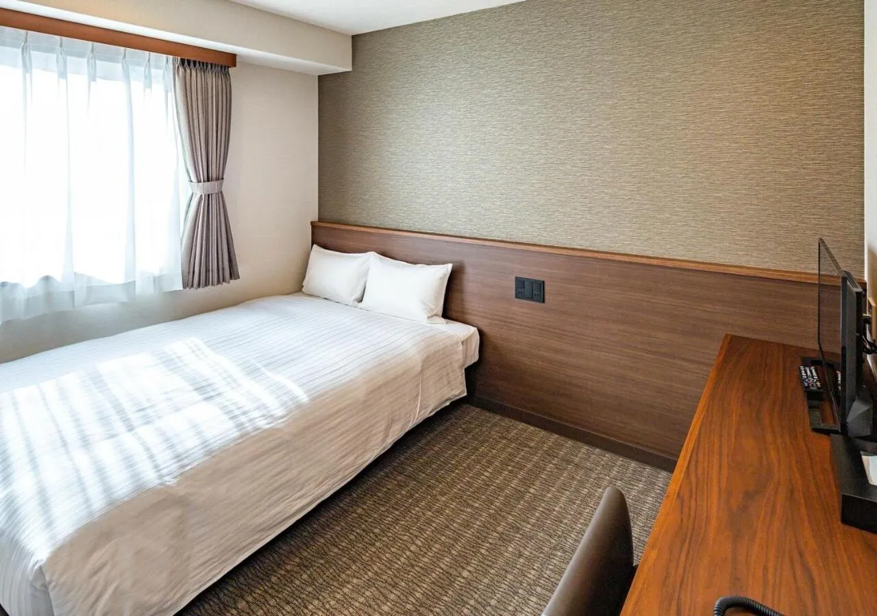 Bed in Bande Hotel Tenpozan Higashi