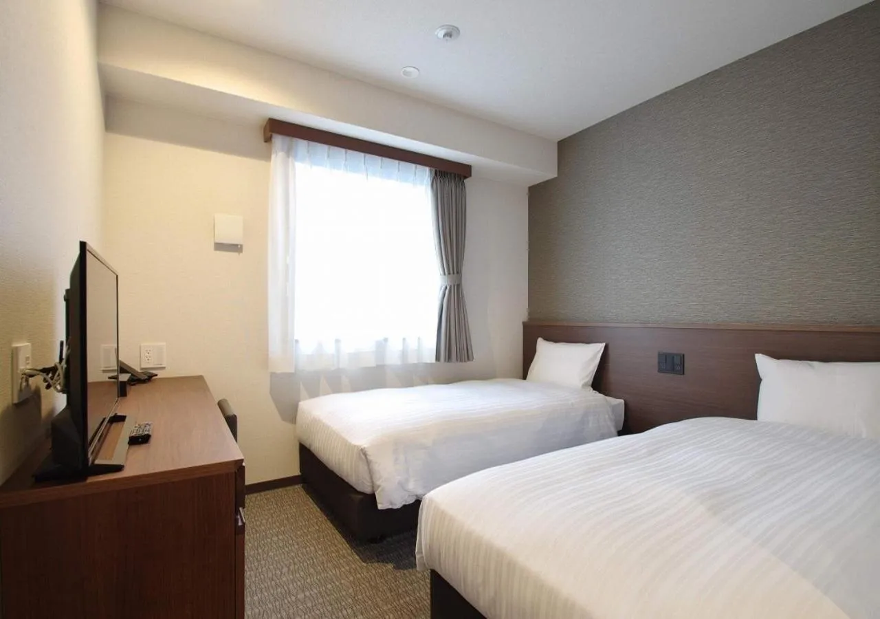 Bed in Bande Hotel Tenpozan Higashi
