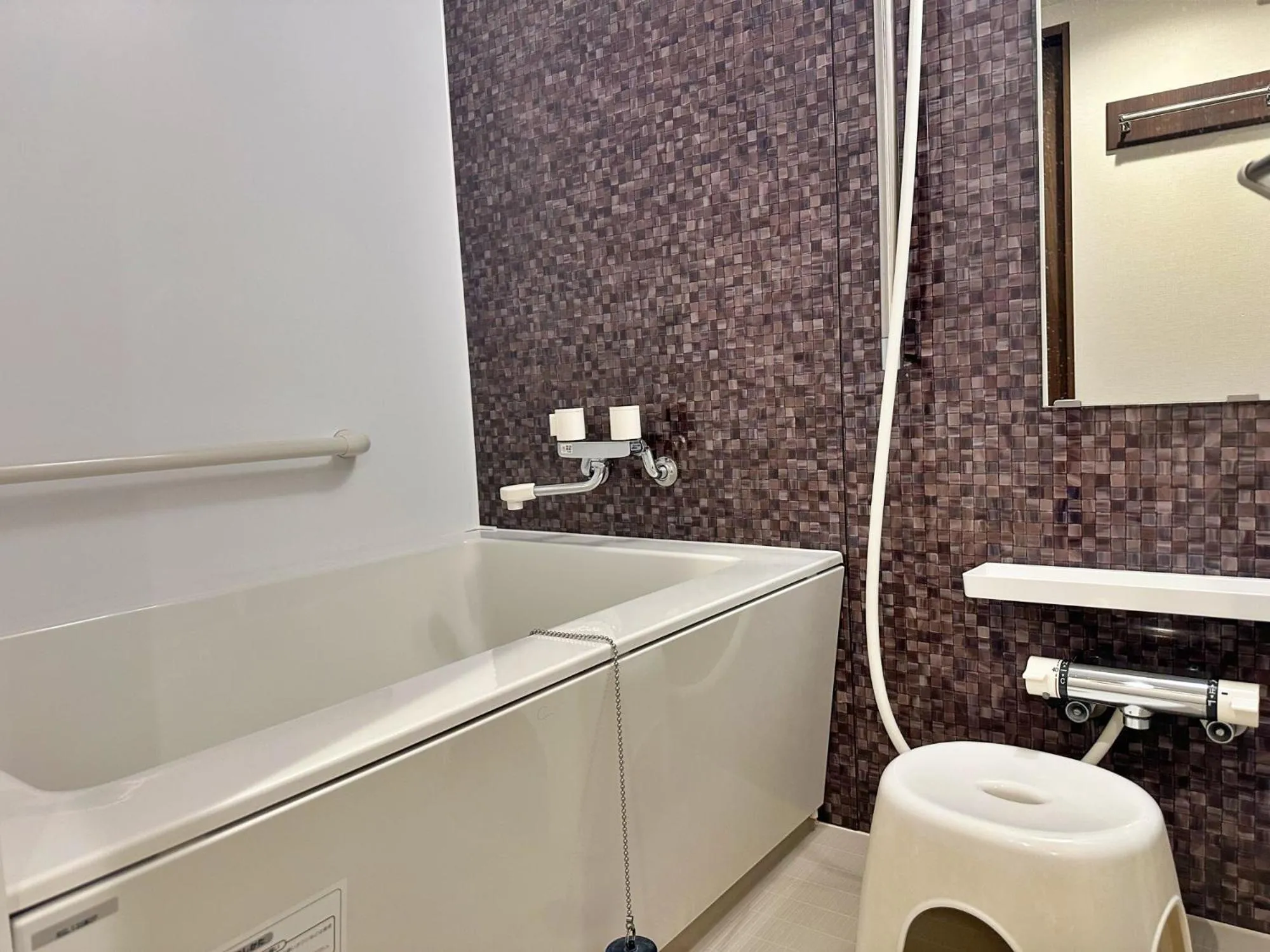 Bathroom in Bande Hotel Tenpozan Higashi