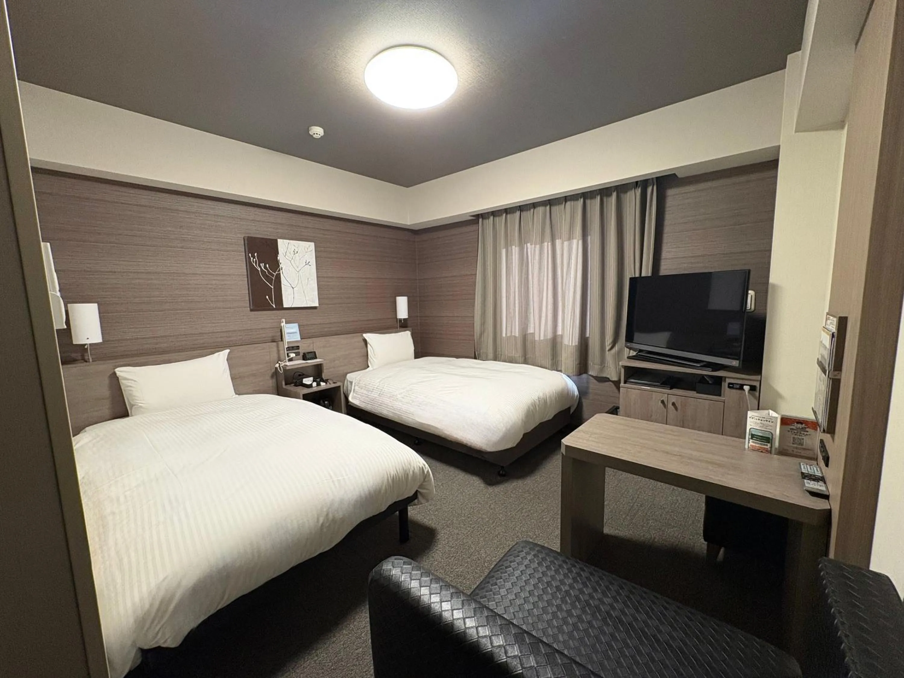 Photo of the whole room, Bed in Hotel Route-Inn Shinfujieki Minami