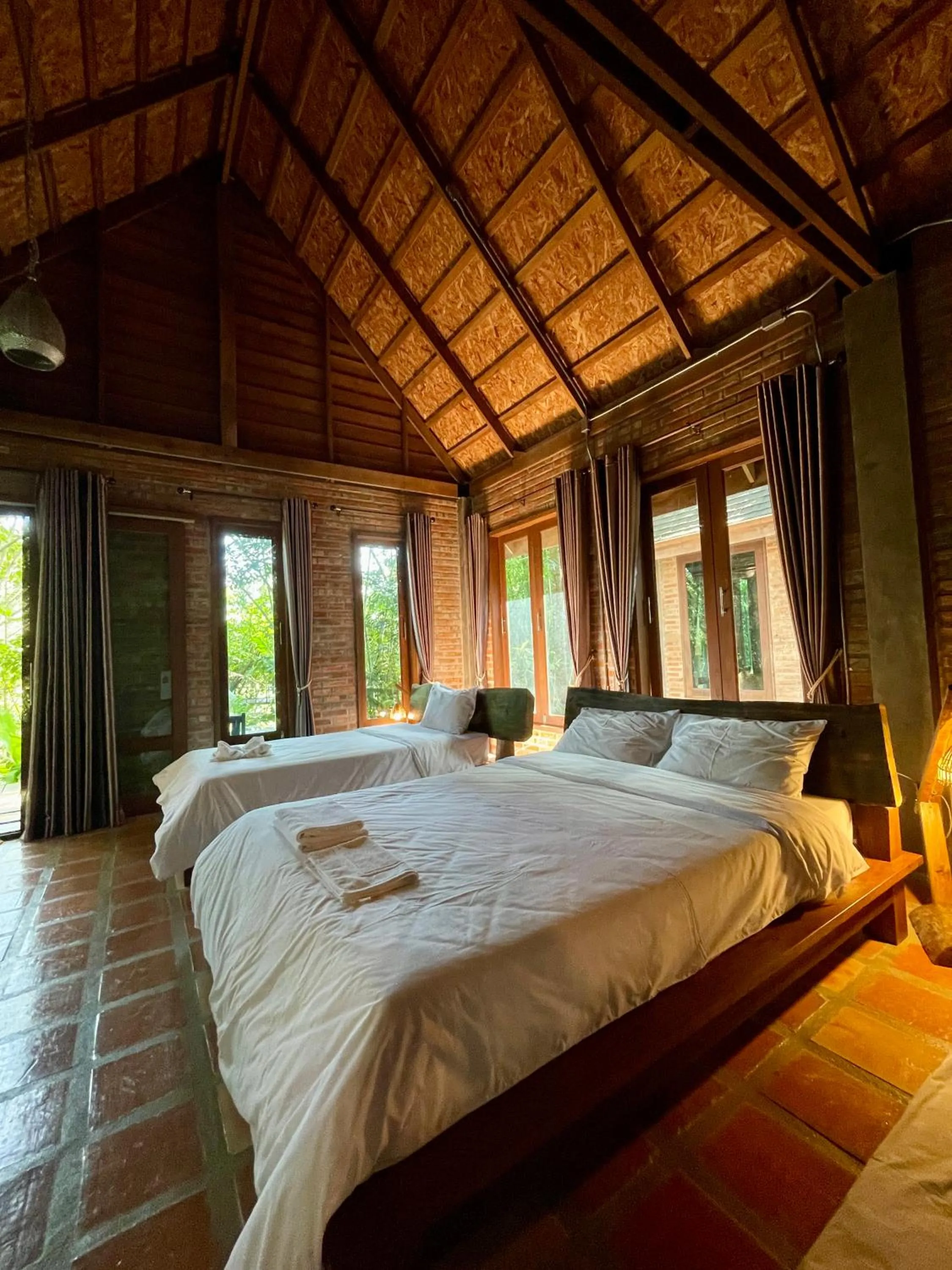 Bed in Kung Nok Tha Resort Nakhon Si Thammarat