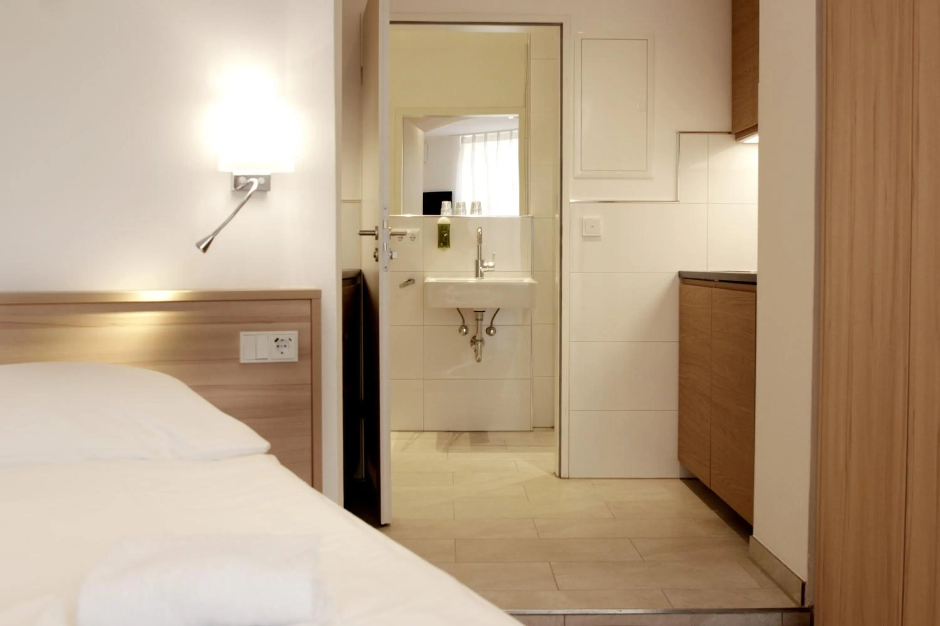 Photo of the whole room, Bed in Hotel ADRIA München