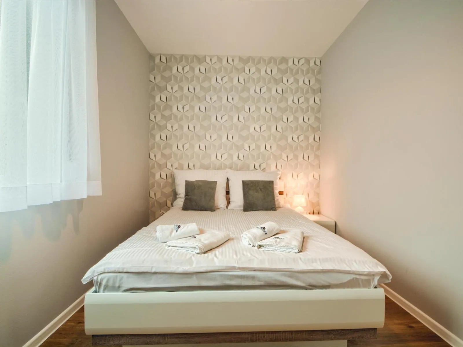 Property logo or sign, Bed in Apartamenty Szarotka