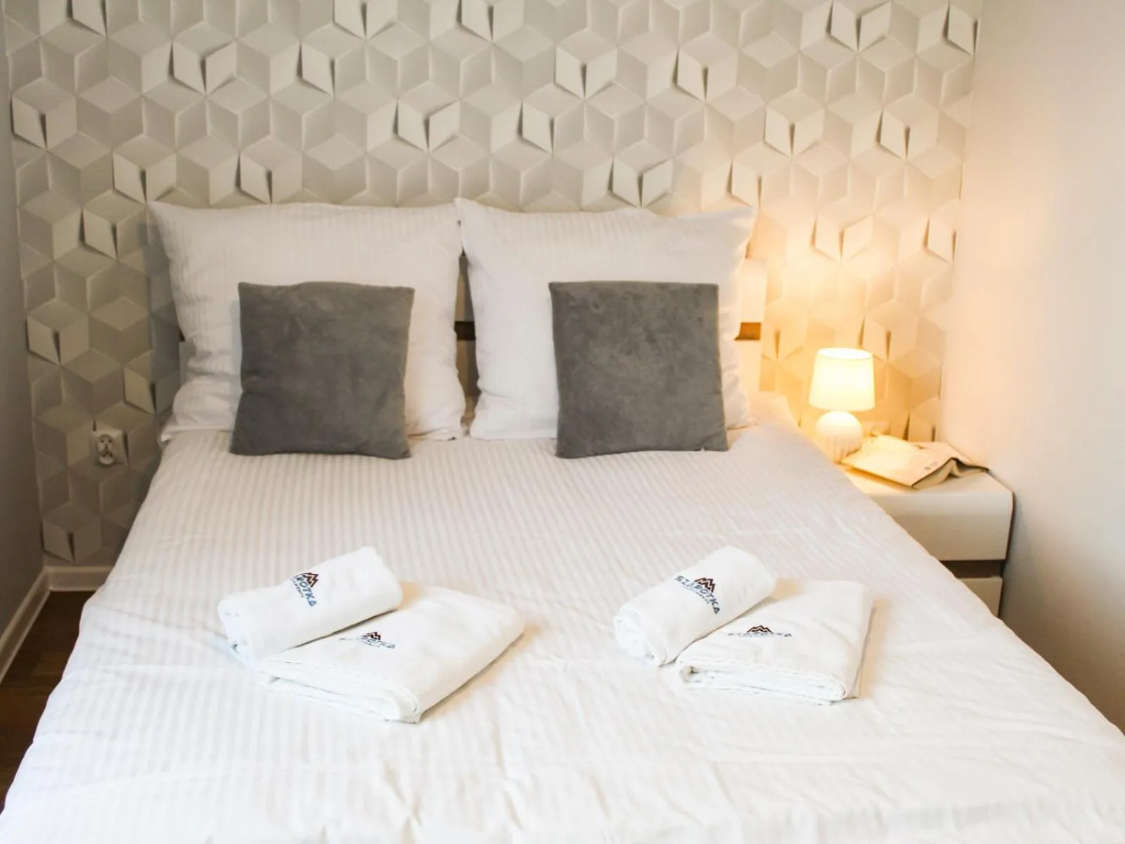 Property logo or sign, Bed in Apartamenty Szarotka