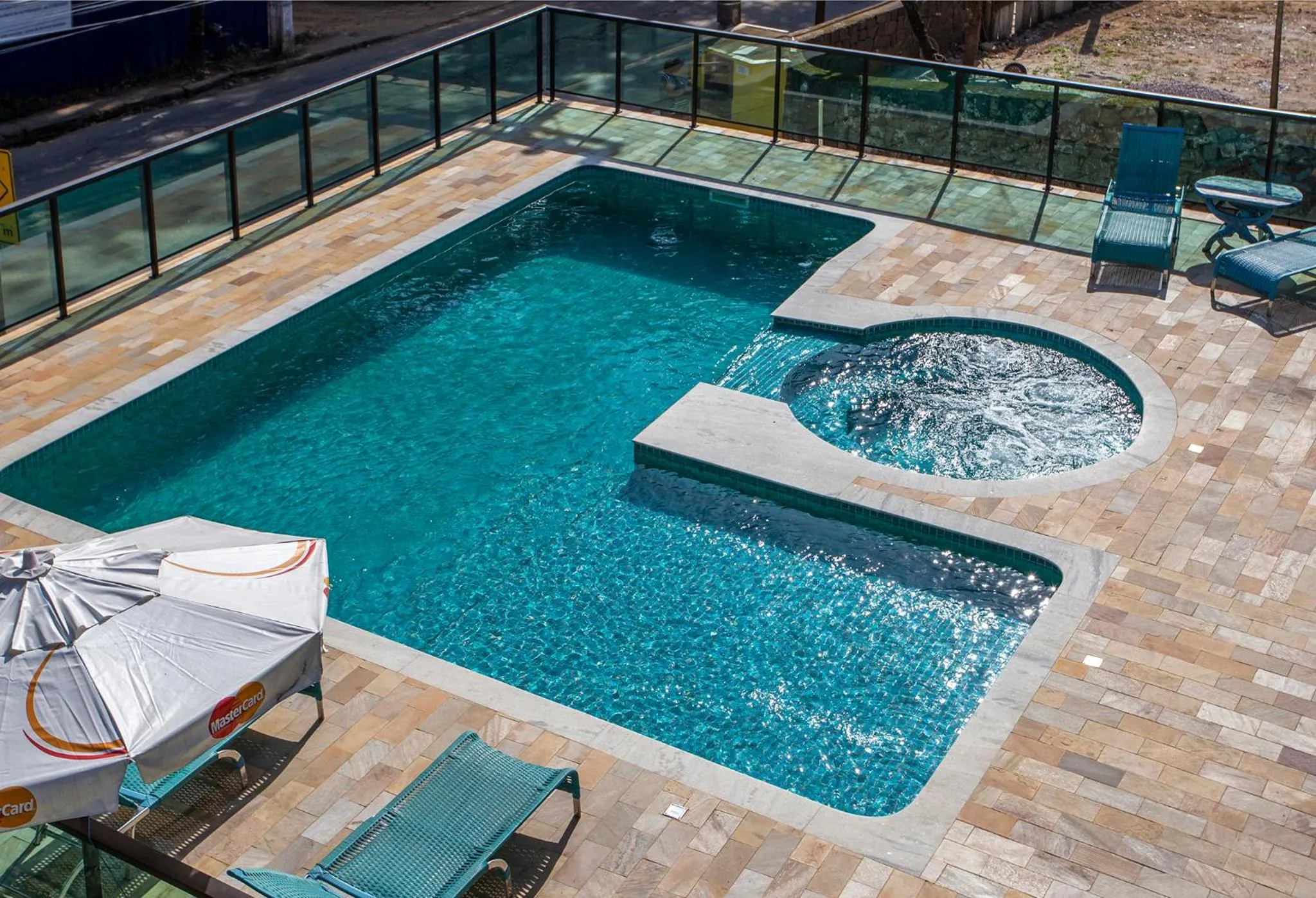 Swimming pool in Pousada Guarubela Veloso