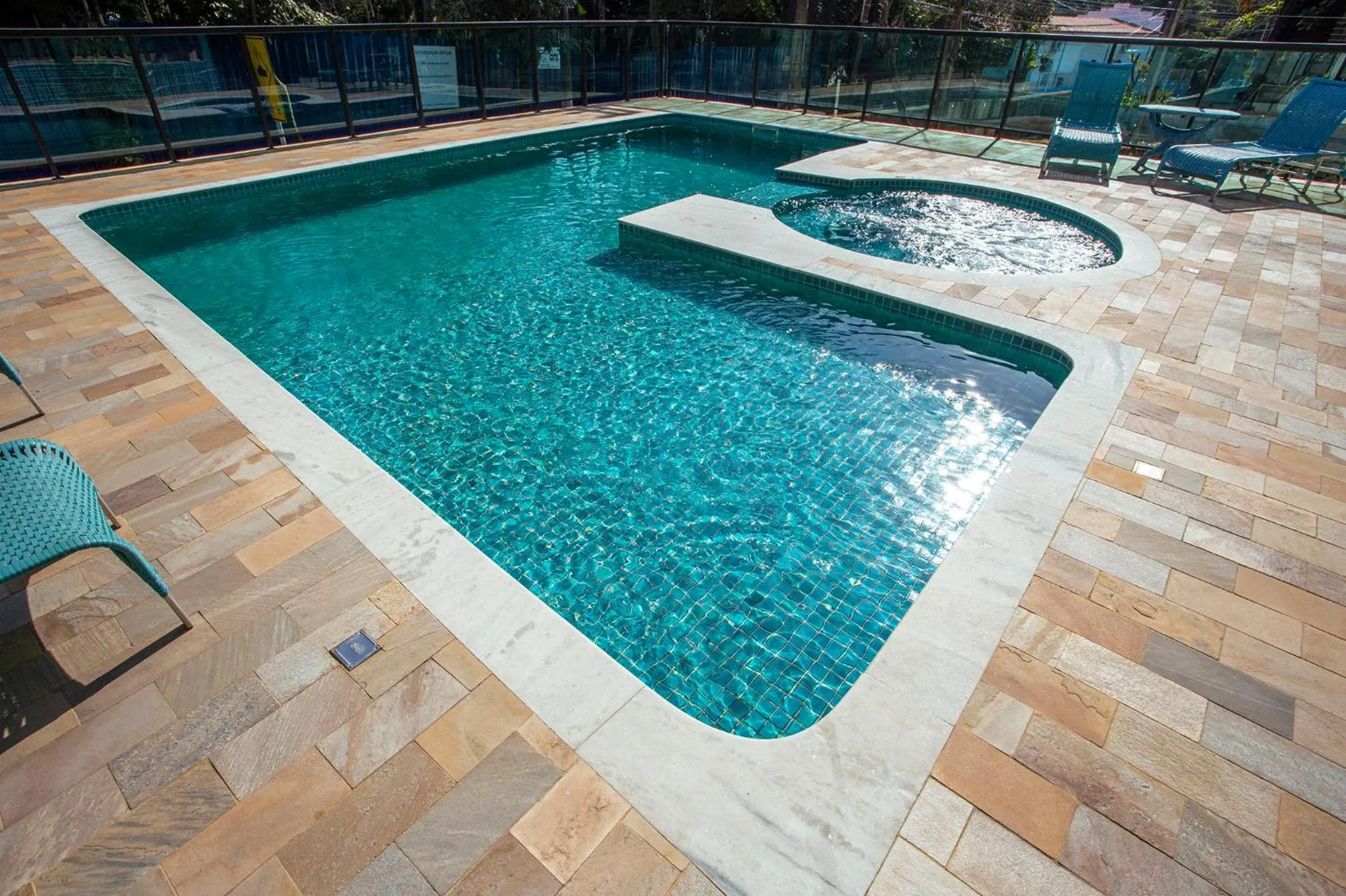 Swimming pool in Pousada Guarubela Veloso