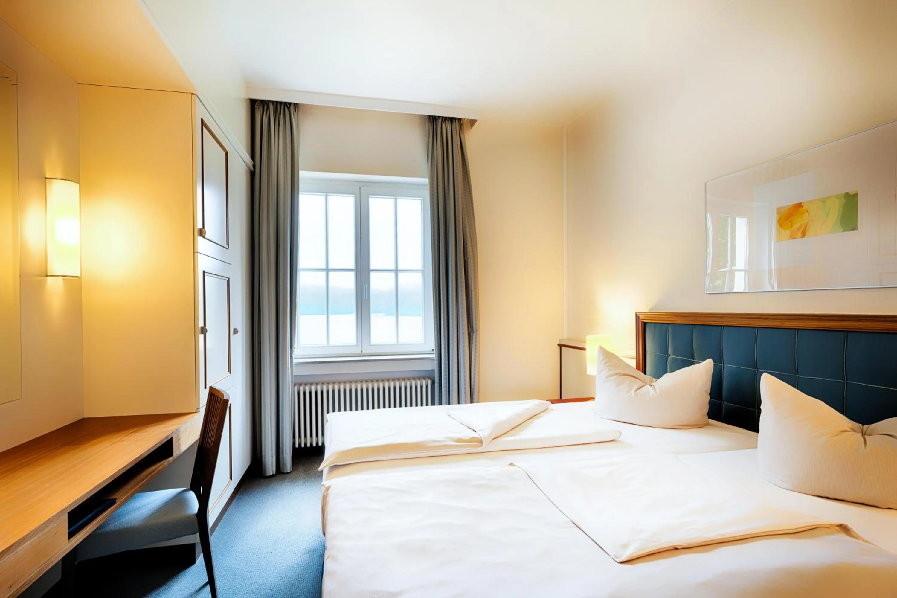 Photo of the whole room, Bed in Welcome Hotel Meschede Hennesee