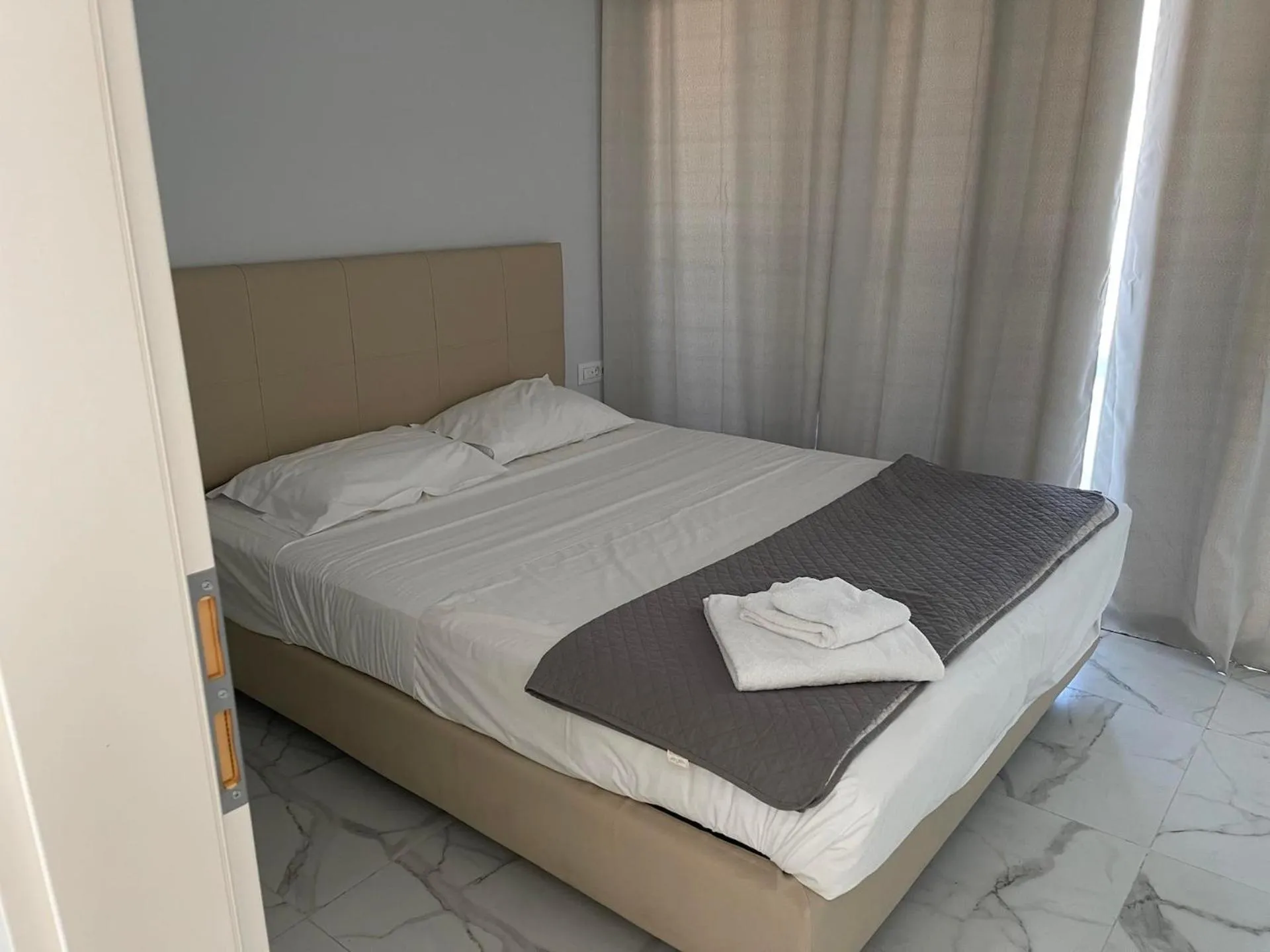 Bed in Pals Studios Pefkos