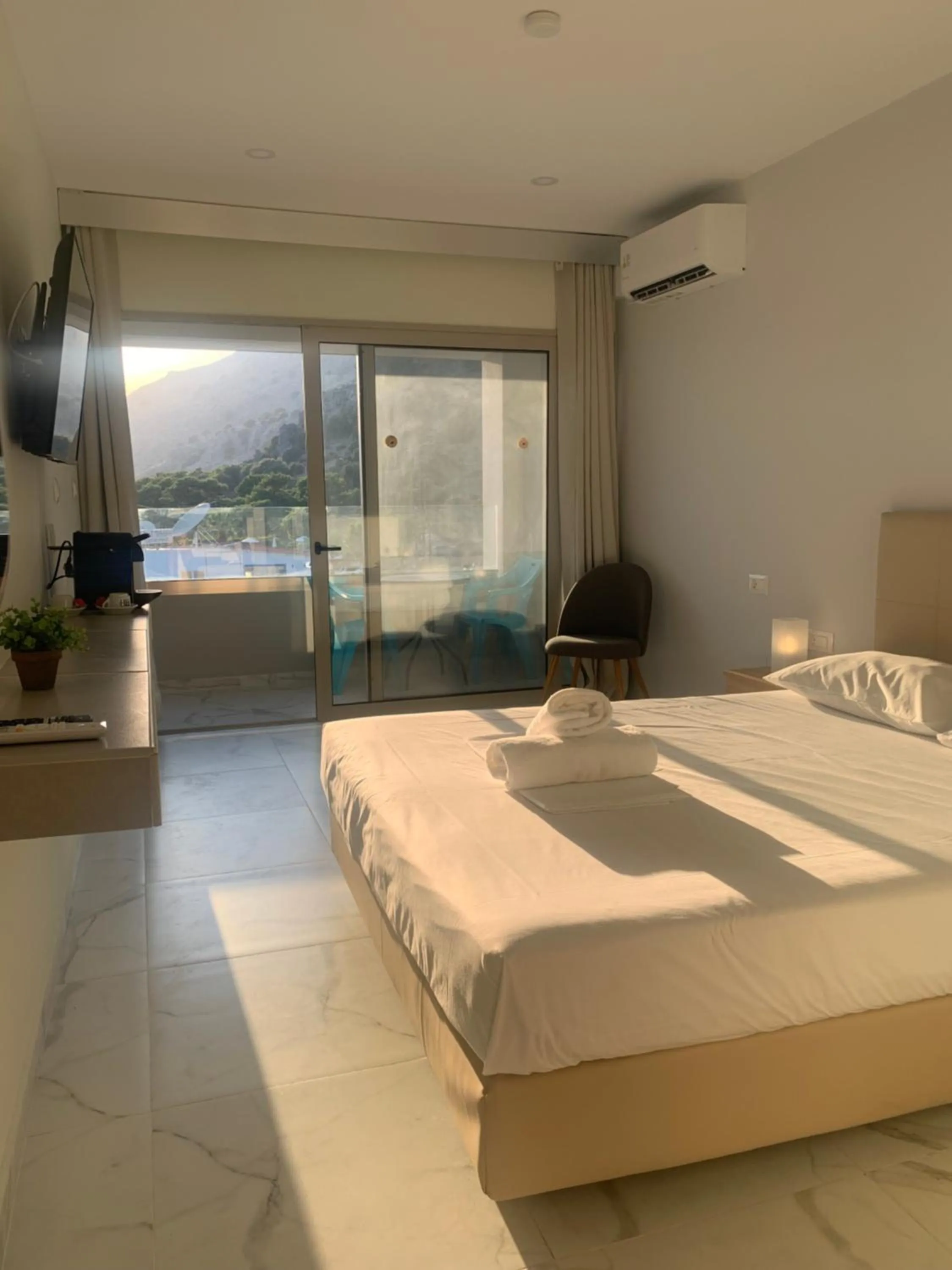 Bed in Pals Studios Pefkos