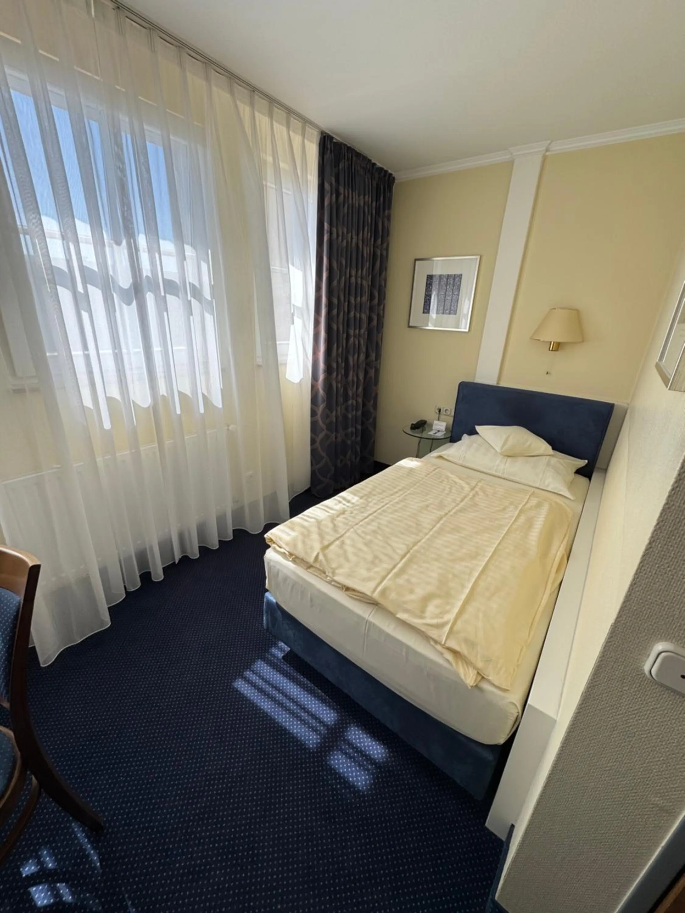 Bed in Hotel Viktoria