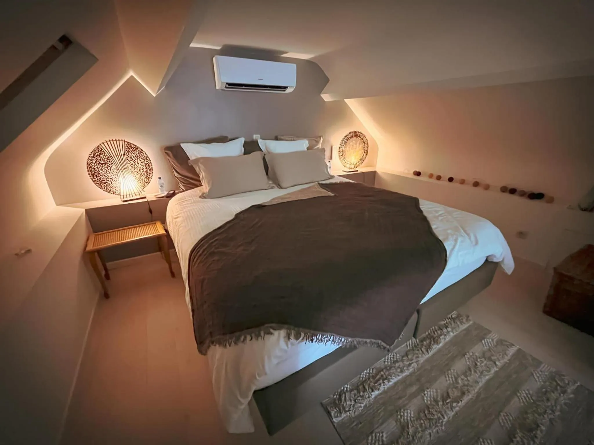 Bed in Le Jardin Des Secrets "Gites et chambres à louer"