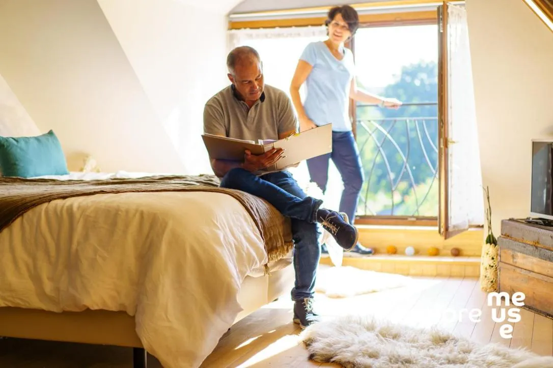Bed in Le Jardin Des Secrets "Gites et chambres à louer"