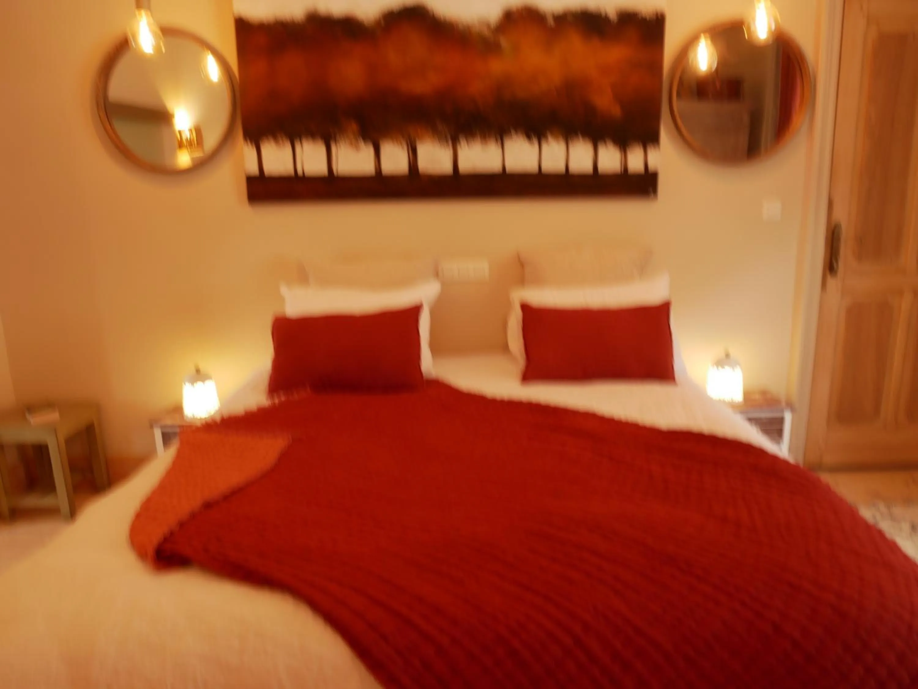 Bed in Le Jardin Des Secrets "Gites et chambres à louer"