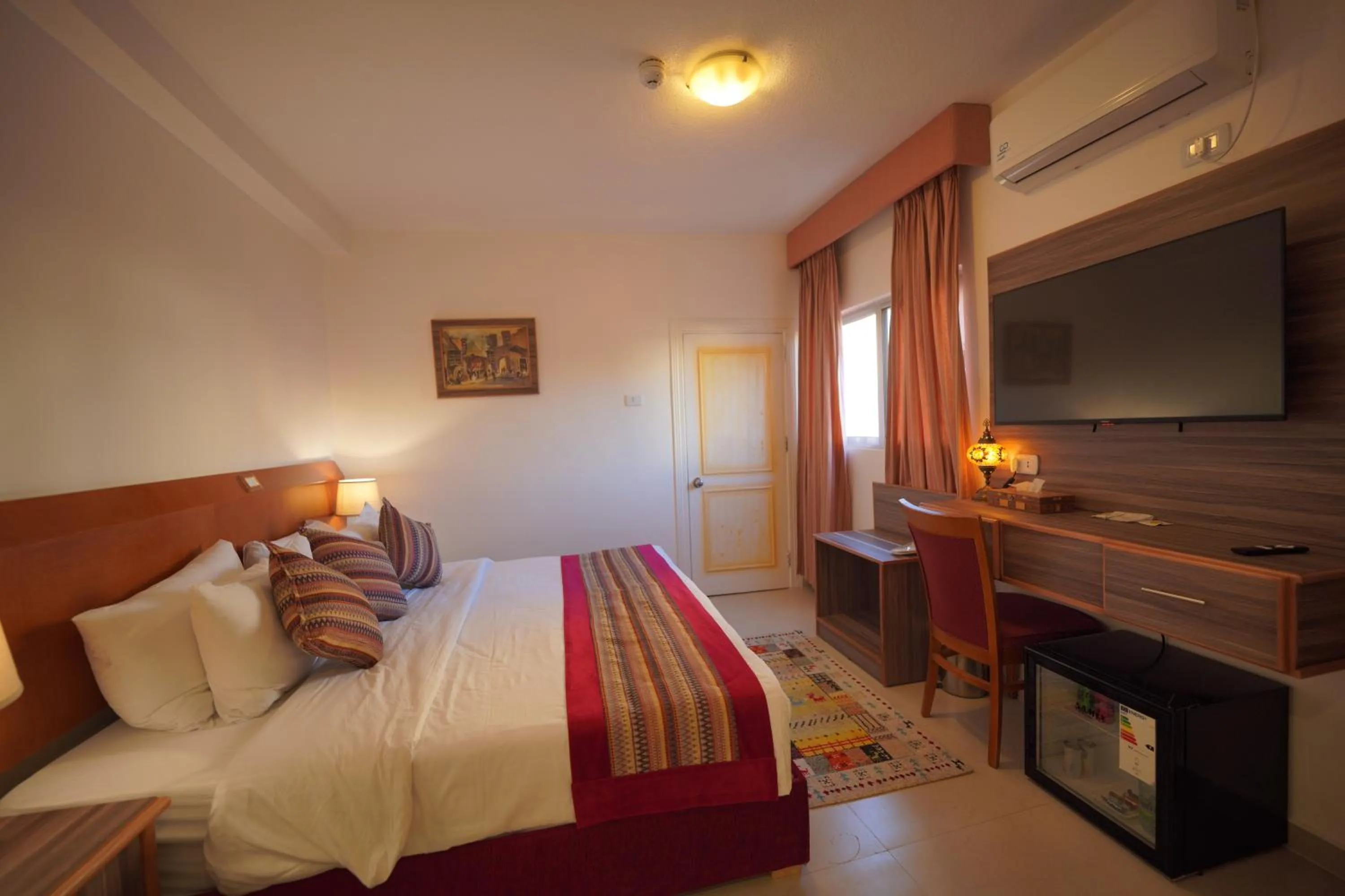 Bed in Petra Plaza Hotel