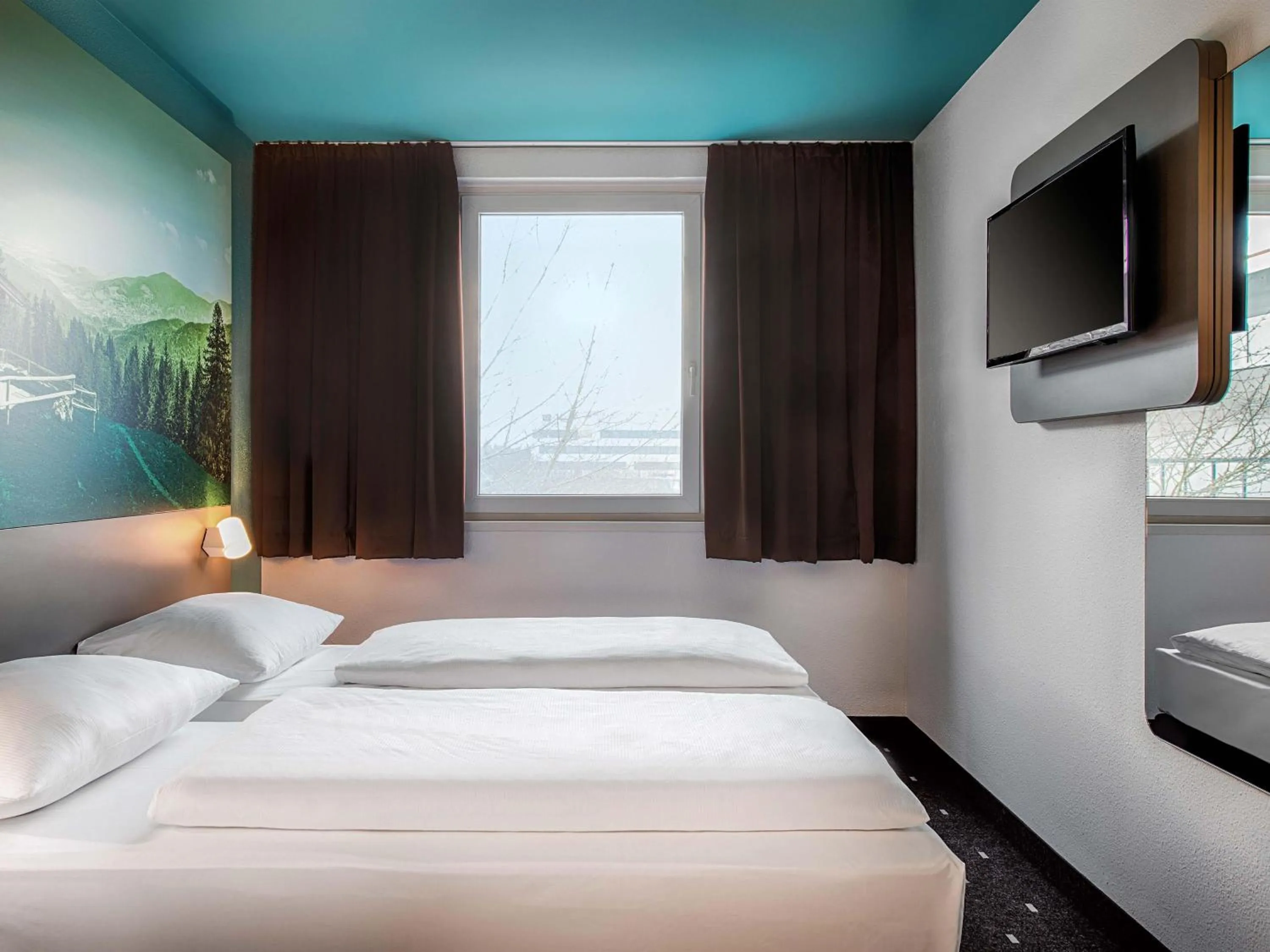 Bed in B&B Hotel München-Putzbrunn